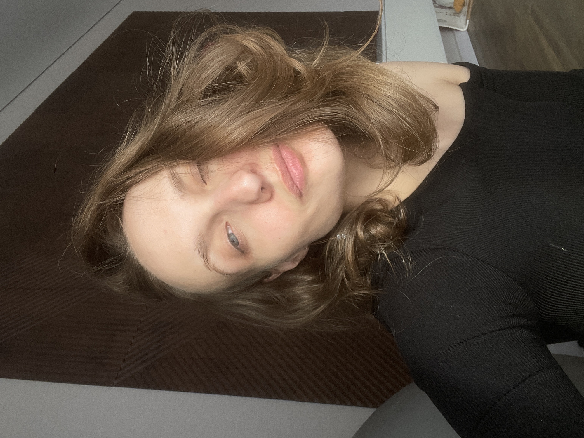 Young woman photographed in indoor portraits in Russian village