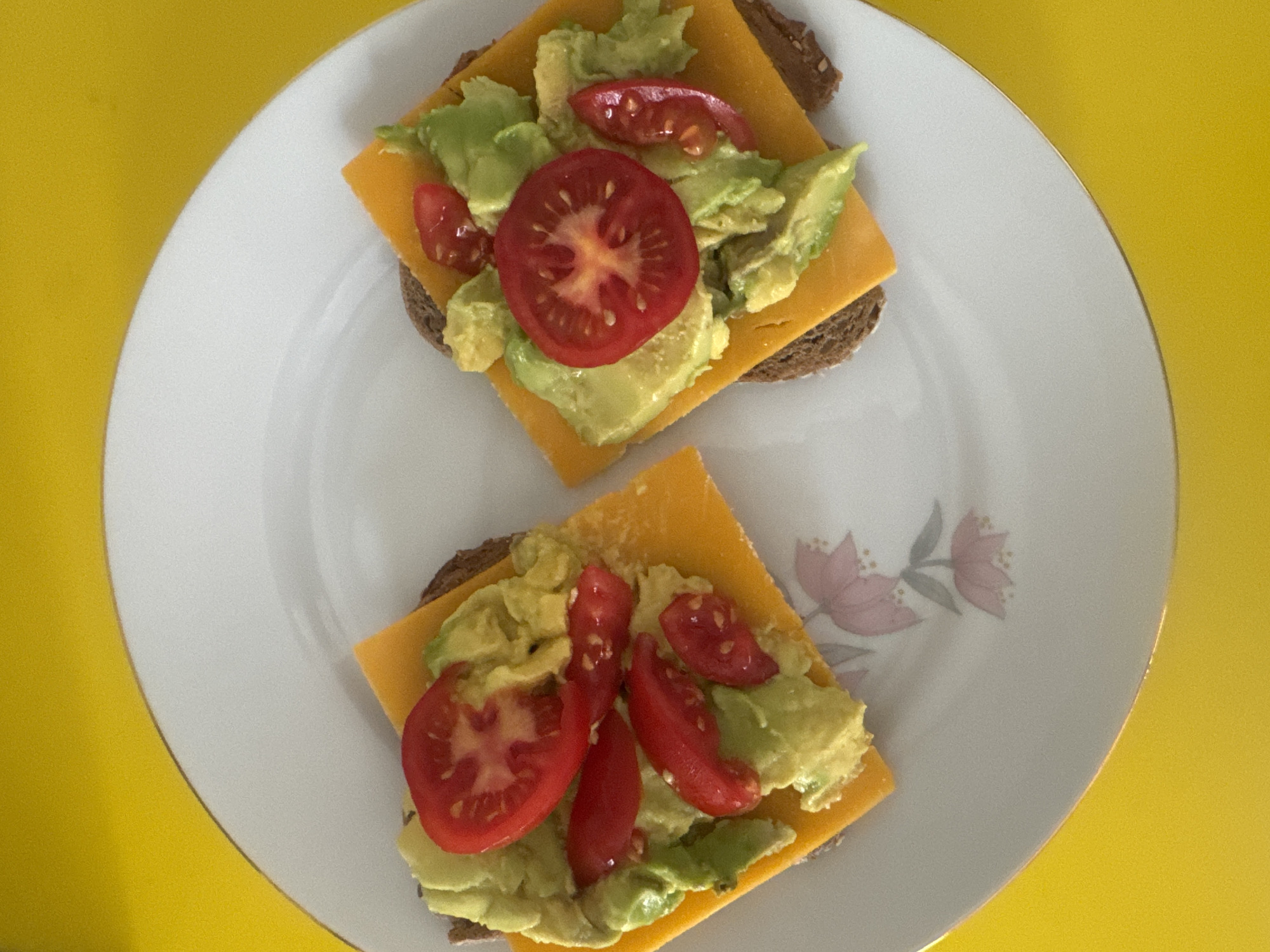 Open-faced sandwiches photographed on floral plate in Ramat Gan