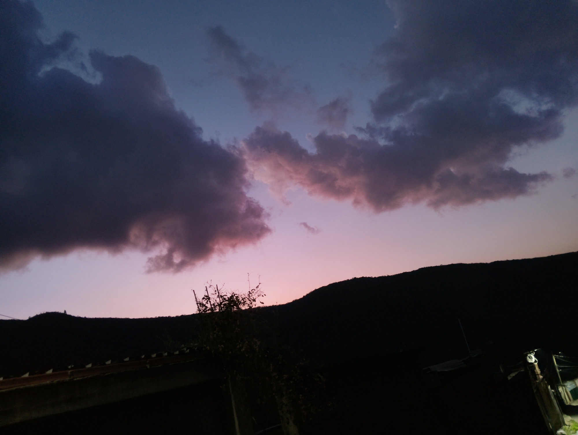 Twilight sky observed over Caracas hills Wednesday evening