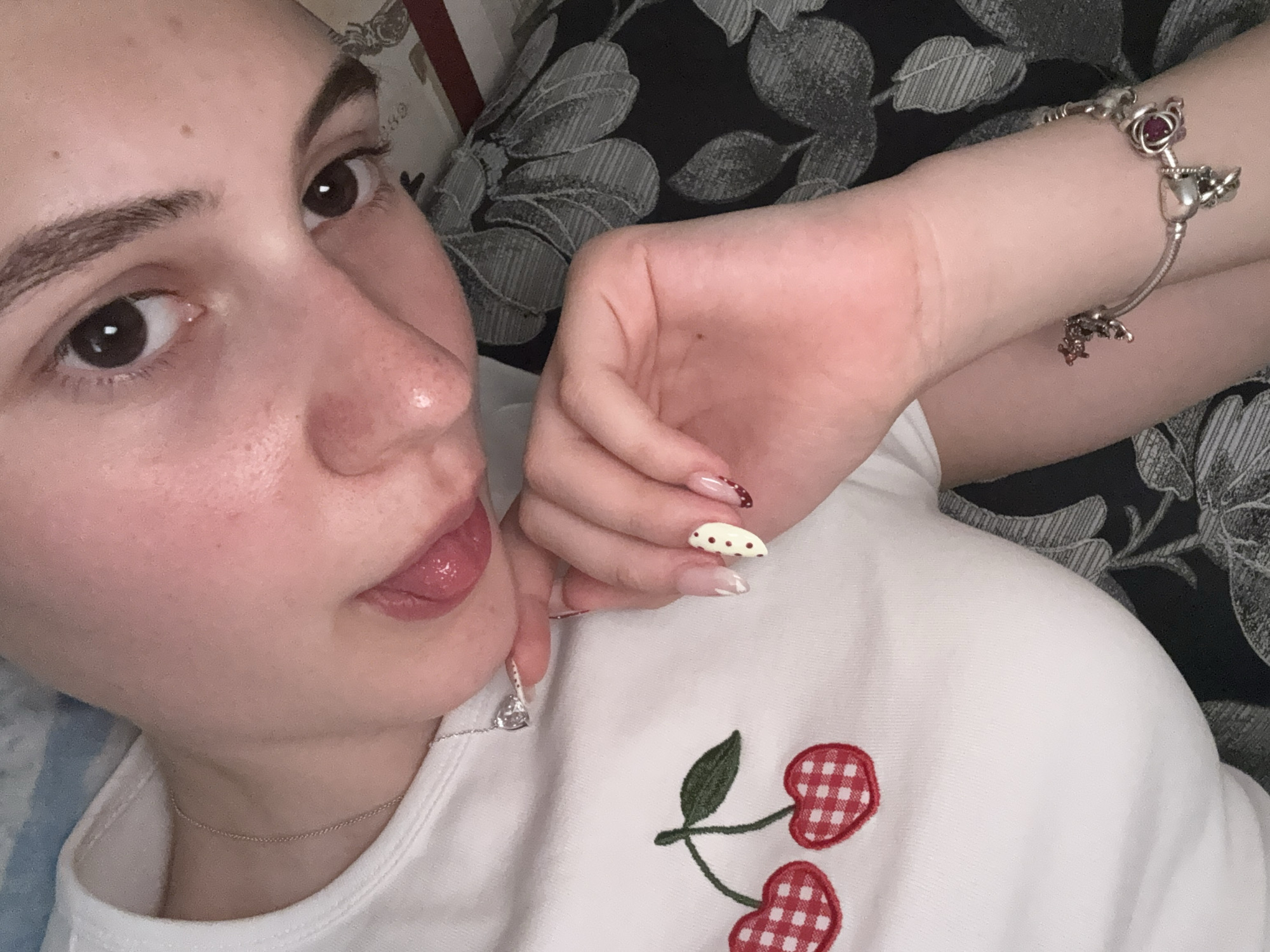 Young person takes casual selfies indoors in Panagyurishte