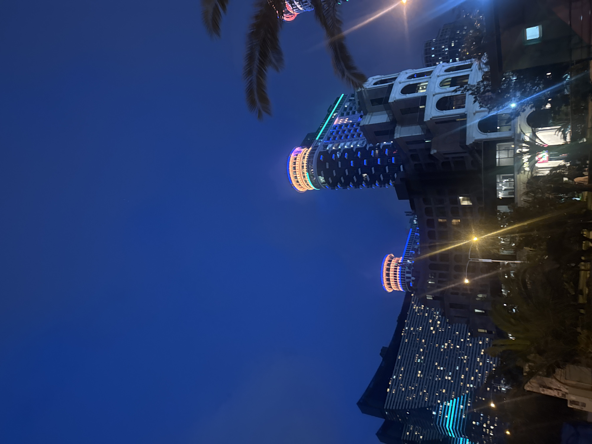 Nighttime coastal city scenes documented during eight-minute evening period