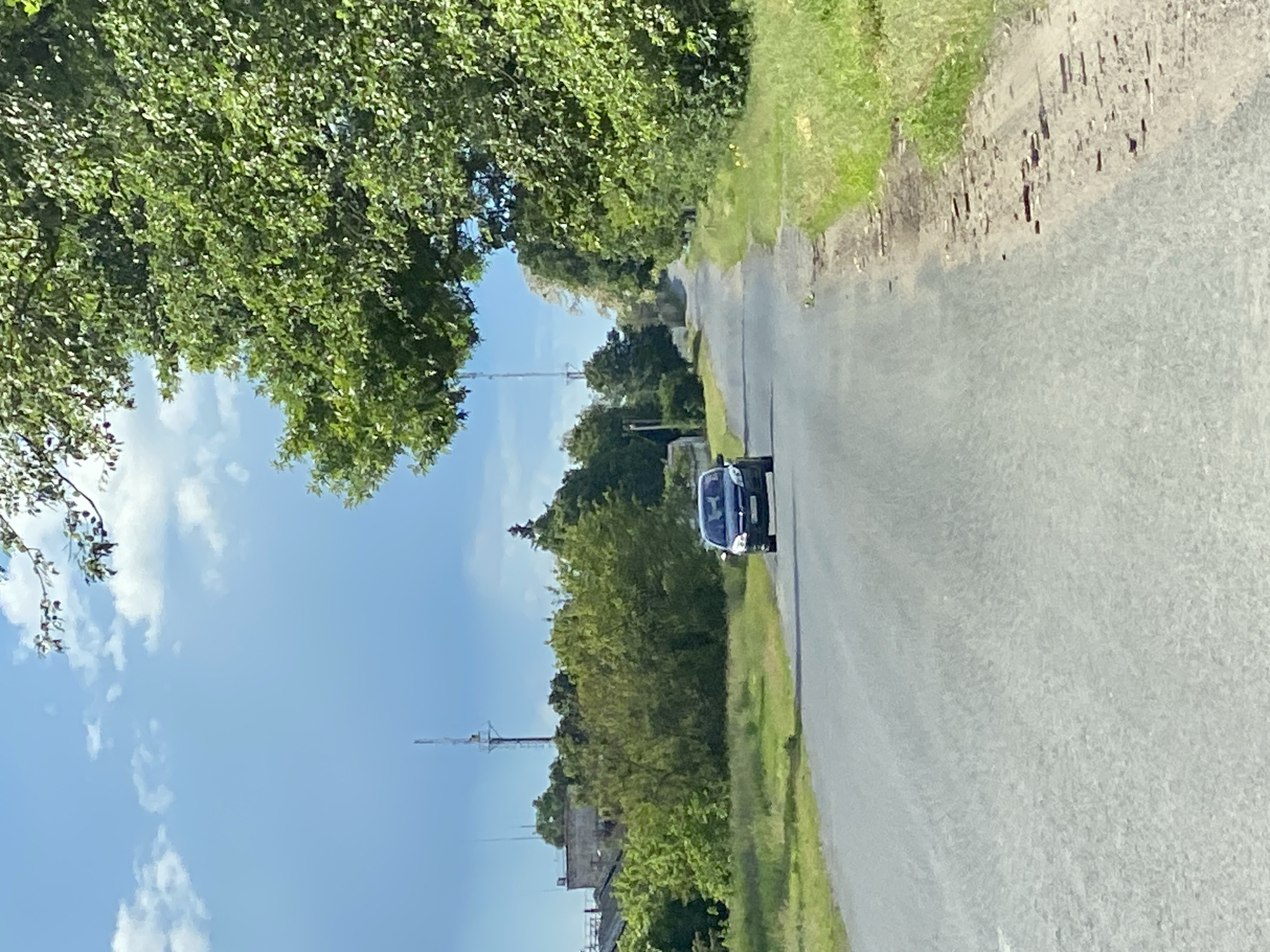 Rural drive through Ustyvytsia countryside documented during afternoon