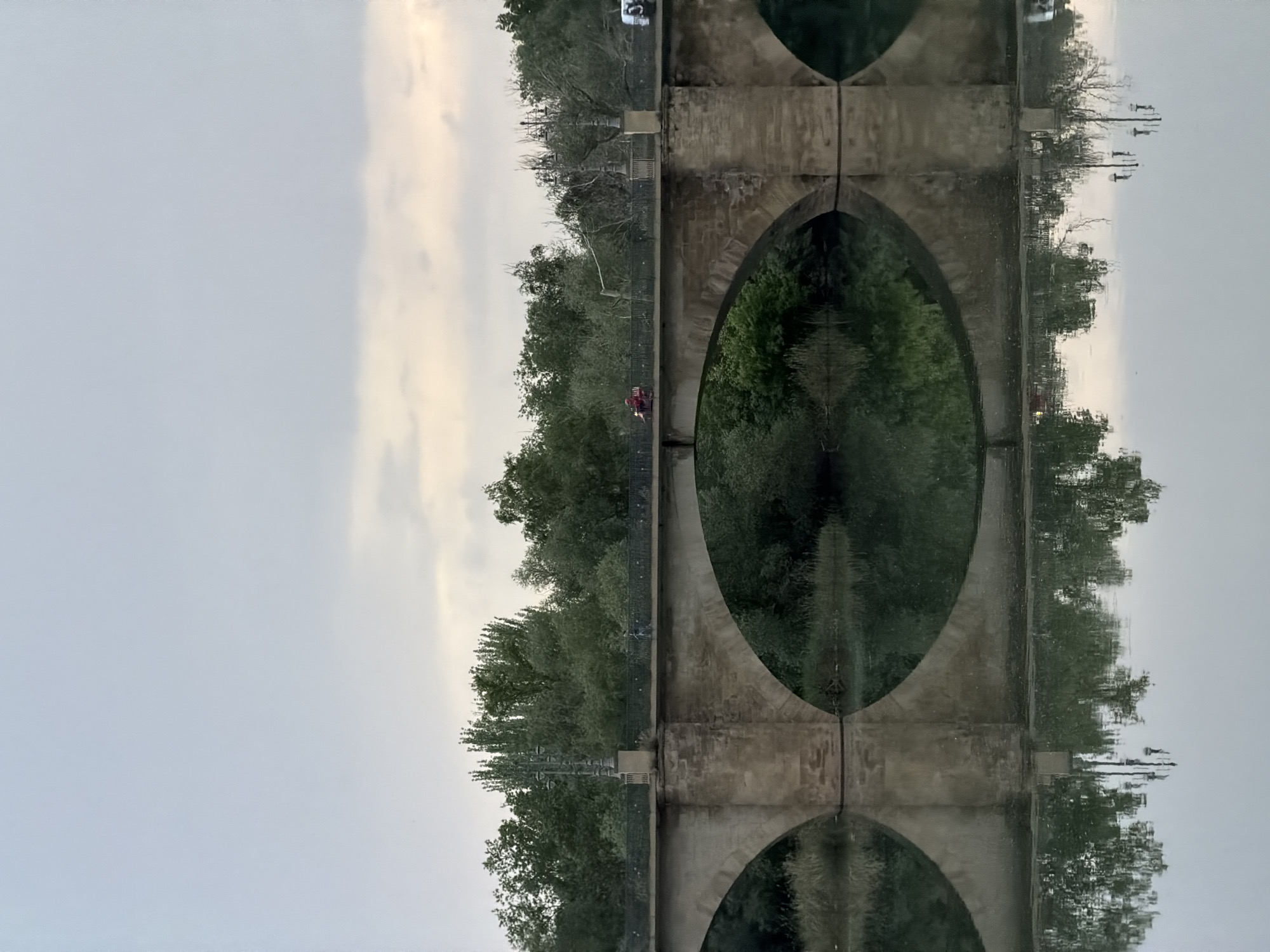 Evening stroll across historic stone bridge in Logroño captured