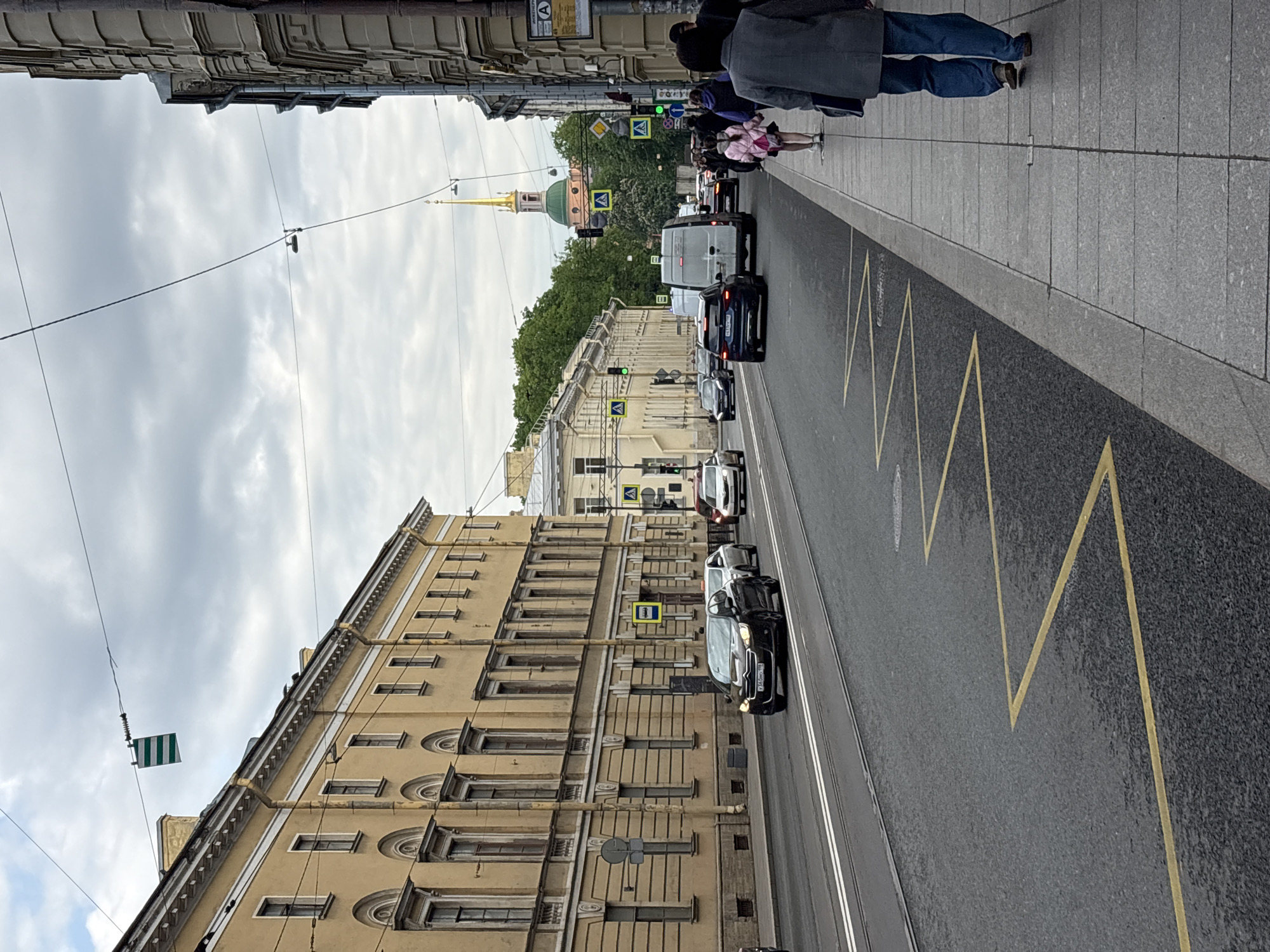 Morning street life documented in historic Saint Petersburg district