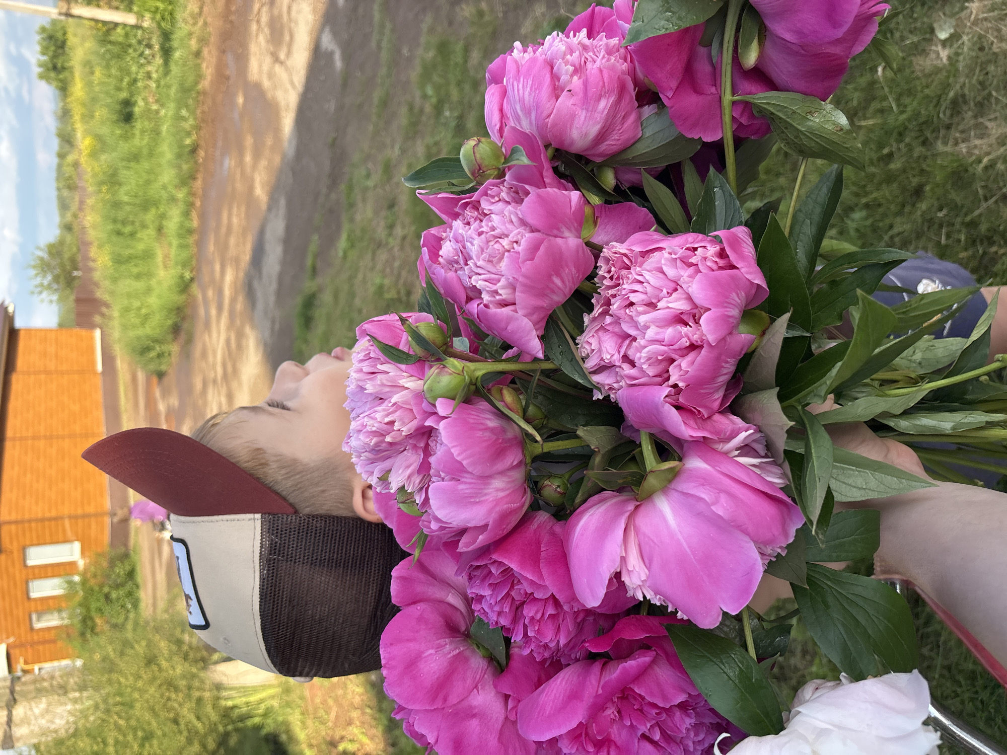 Peony bouquets appear throughout small Russian town afternoon