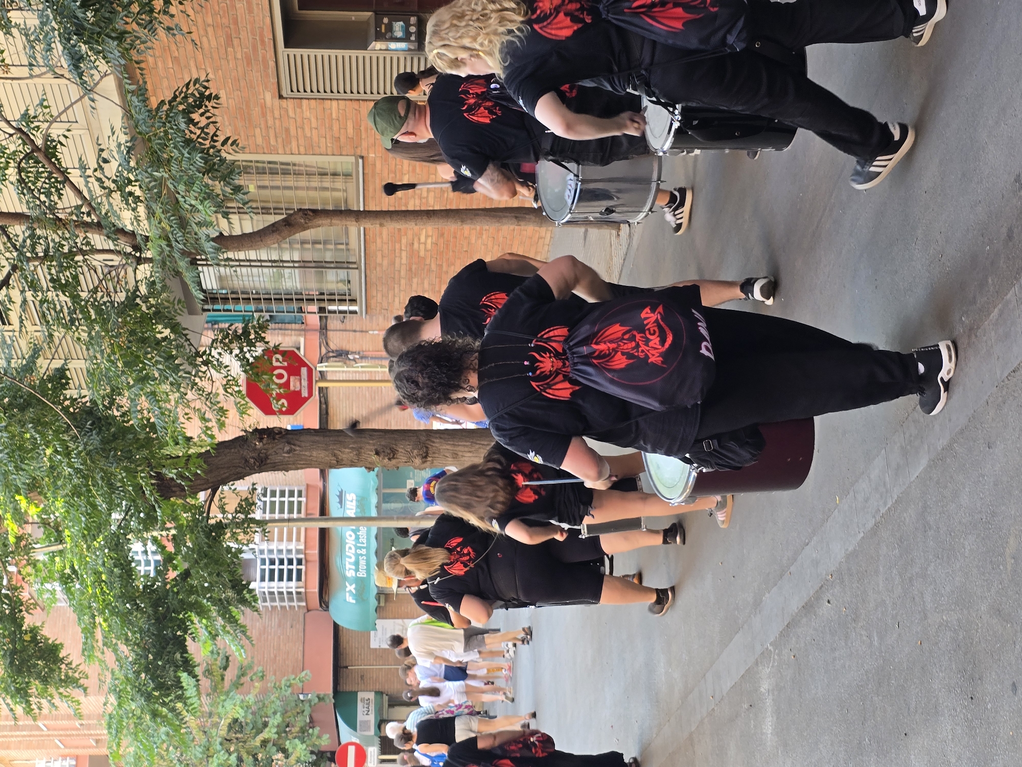 Dragon float, drummers, and stick dancers fill Cornellà streets
