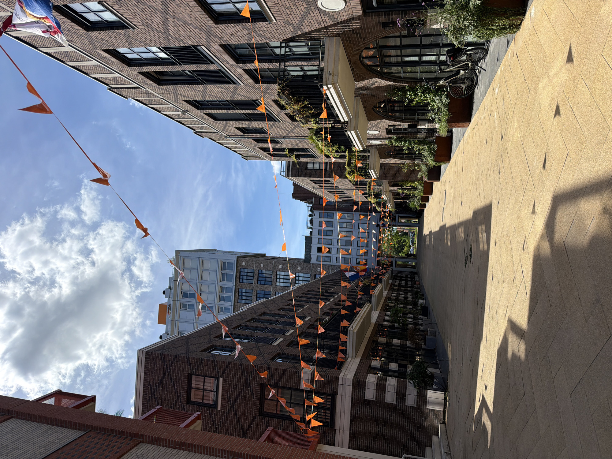 Helmond streets and canal on a sunny afternoon in orange-flag season