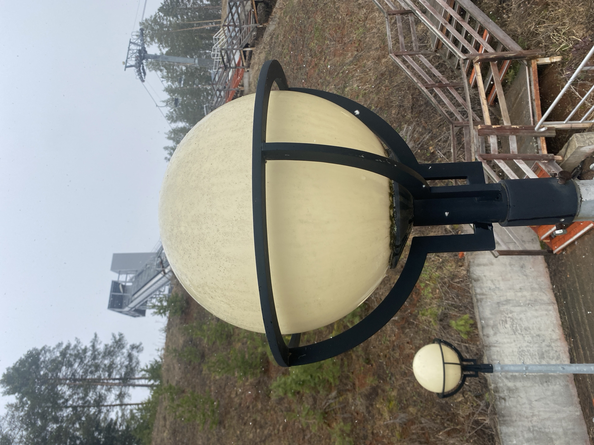 Street lamp photographed during overcast conditions in Прикамский, Russia