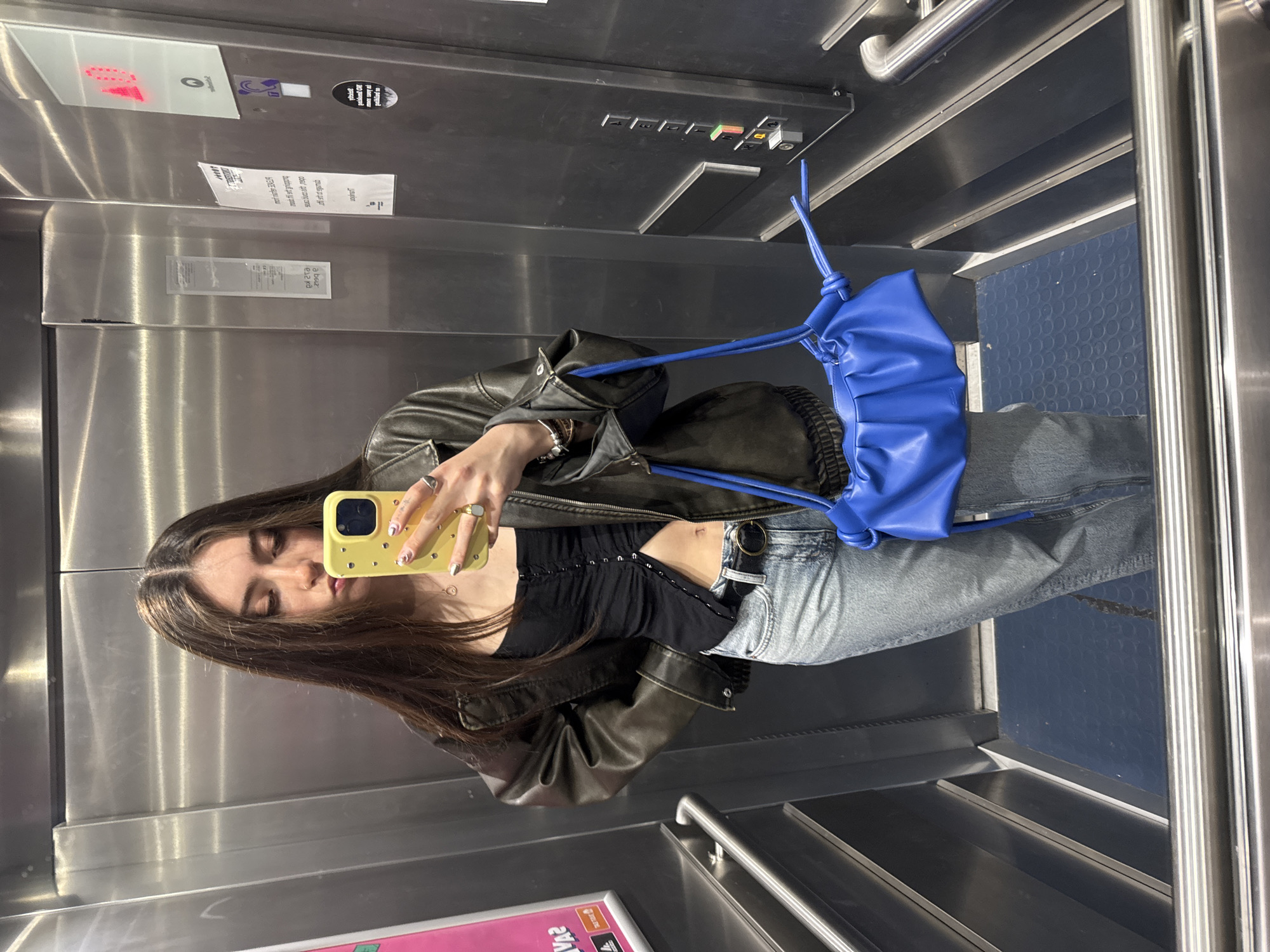 Woman takes elevator selfie in Hull