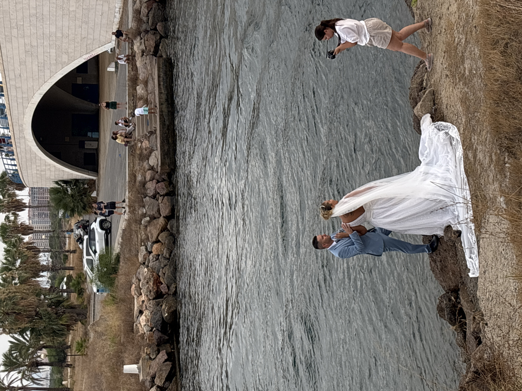 Wedding portrait session on the rocky Mar Menor shoreline