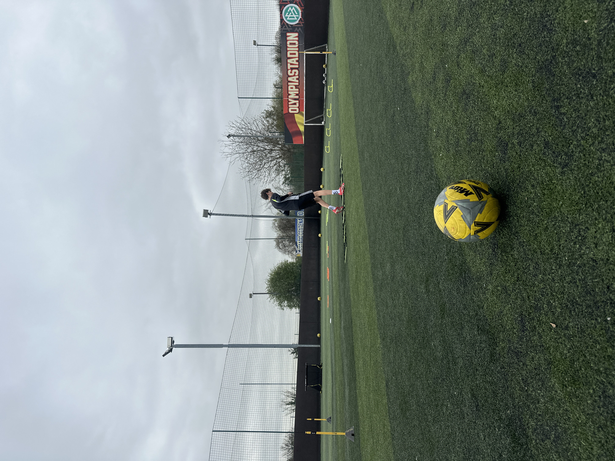 Soccer training session underway on artificial turf in Dartford