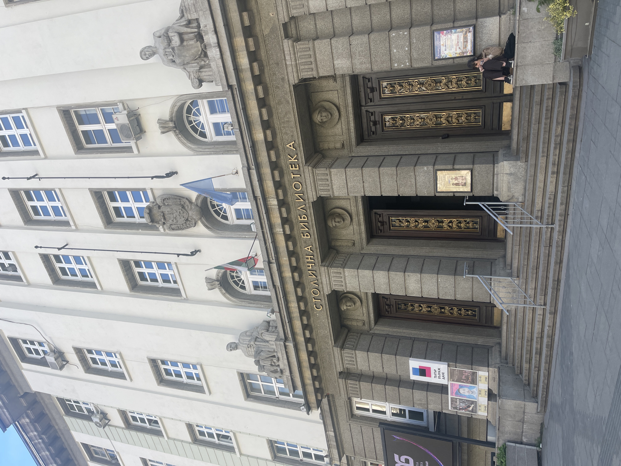 Tourist documents Sofia landmarks, tram system during midday walk