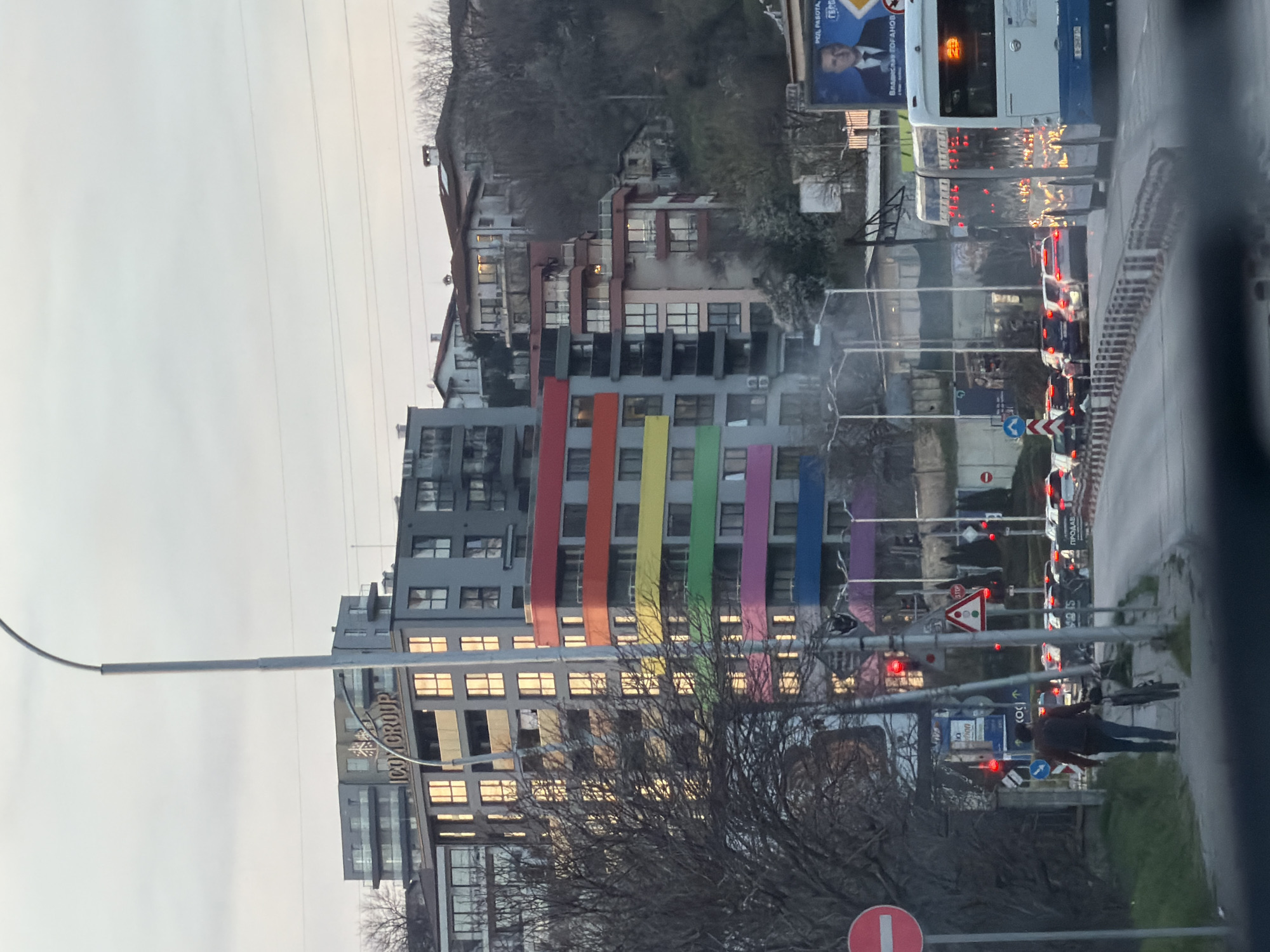 Rainbow-striped building observed in Varna, Bulgaria street scene