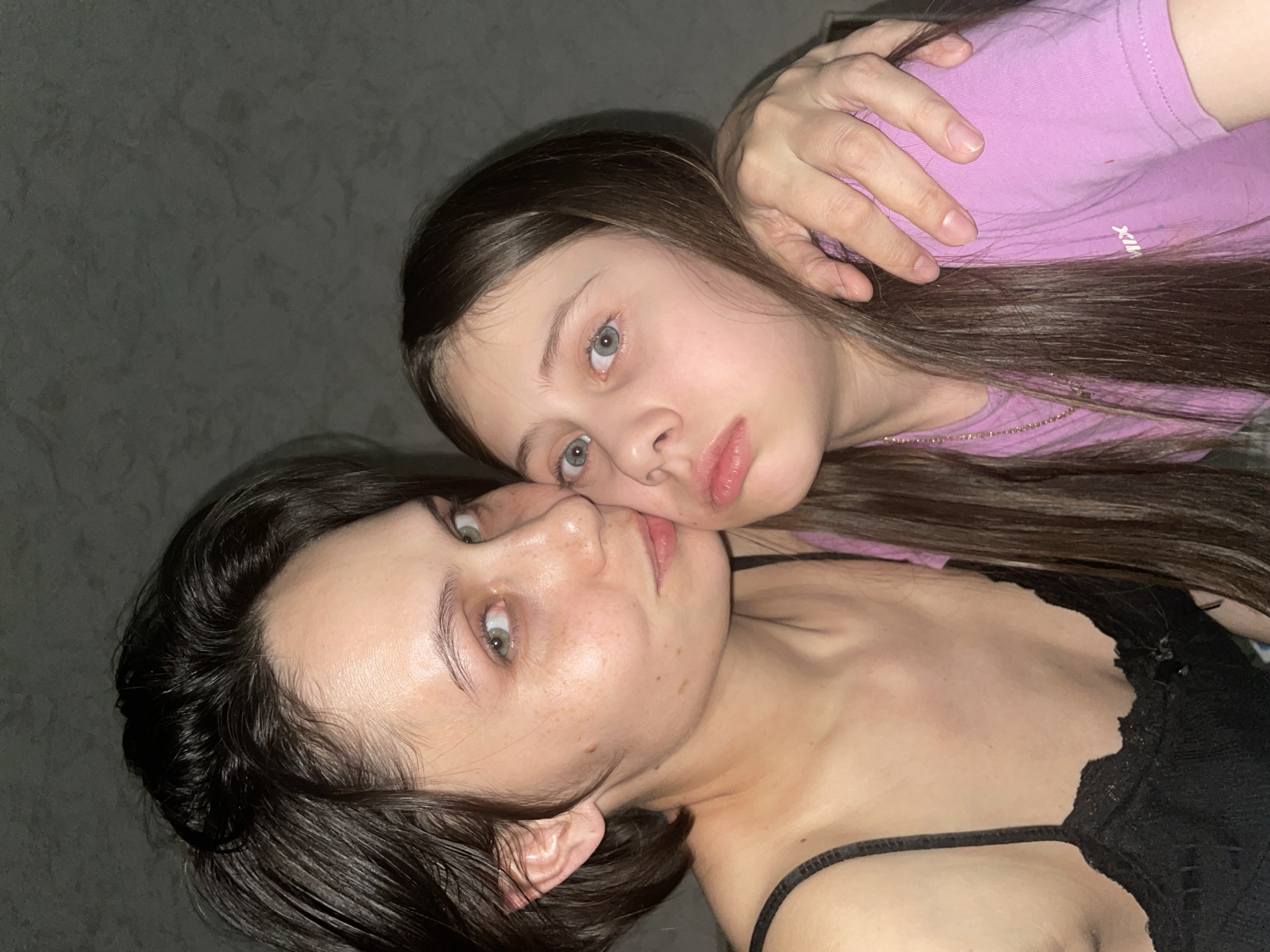 Mother and daughter share intimate portrait moment in Izhevsk