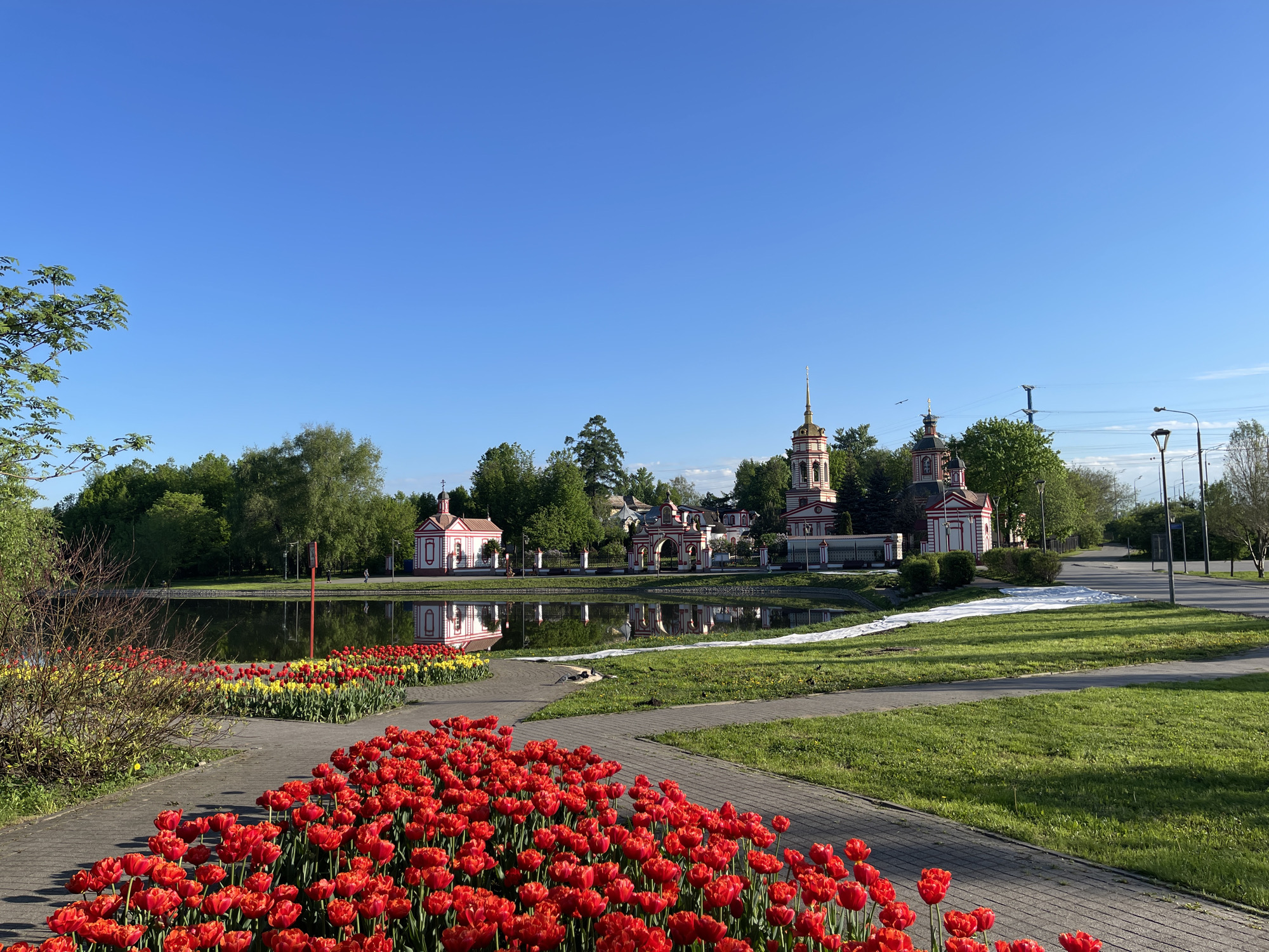 Spring tulips bloom in Moscow park with optical illusion