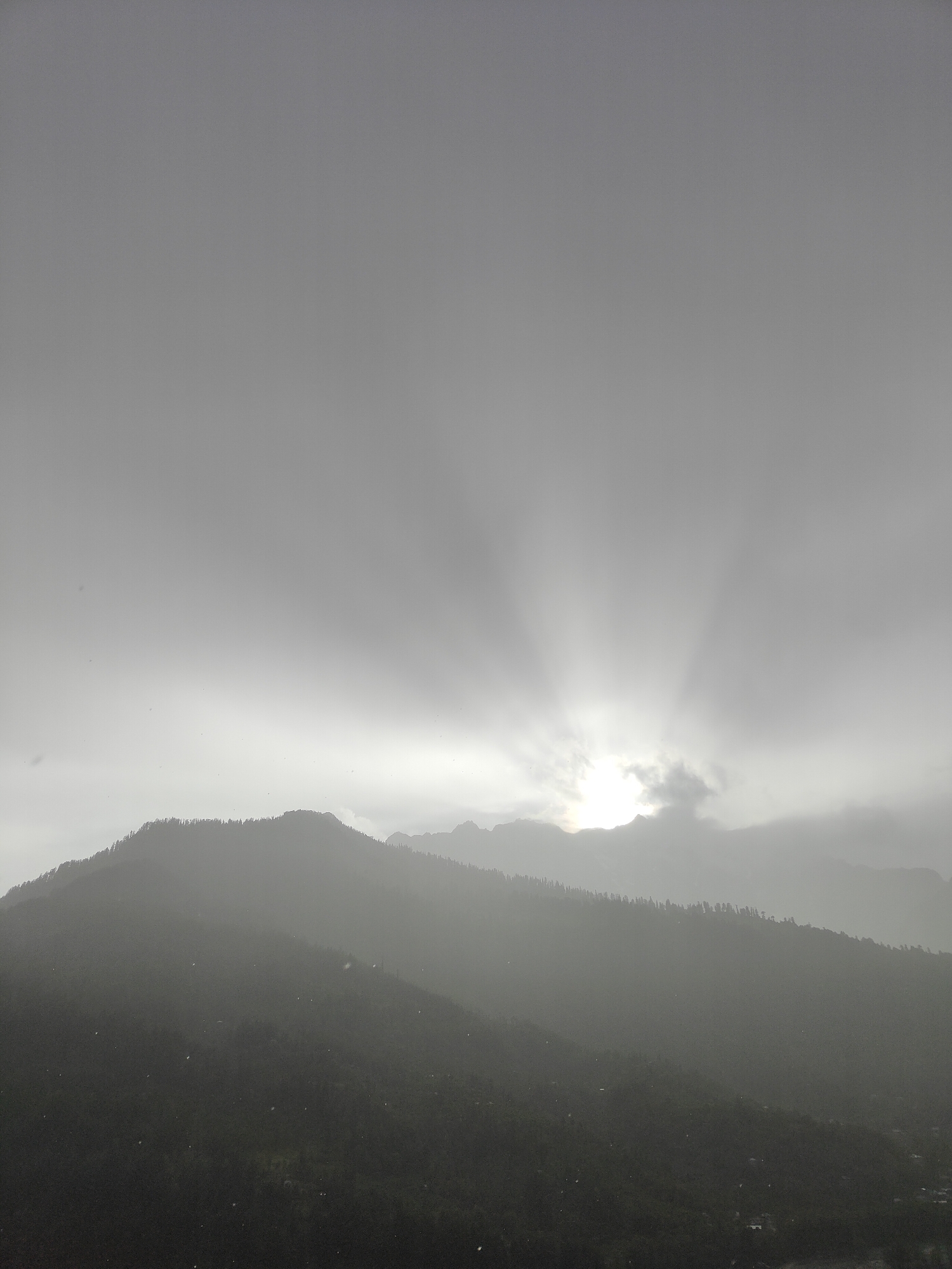 Rainbow and dramatic skies over Vashisht village