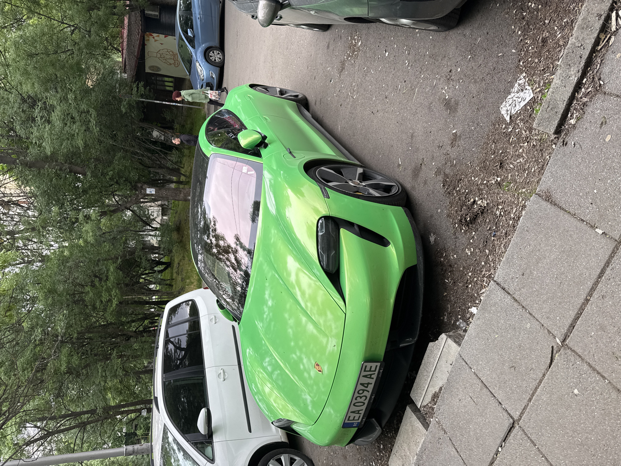 Lime-green Porsche spotted on Sofia street amid spring foliage