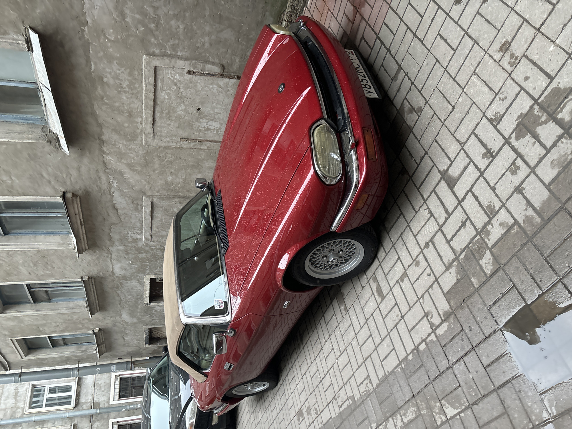 Red Jaguar convertible spotted in Saint Petersburg courtyards