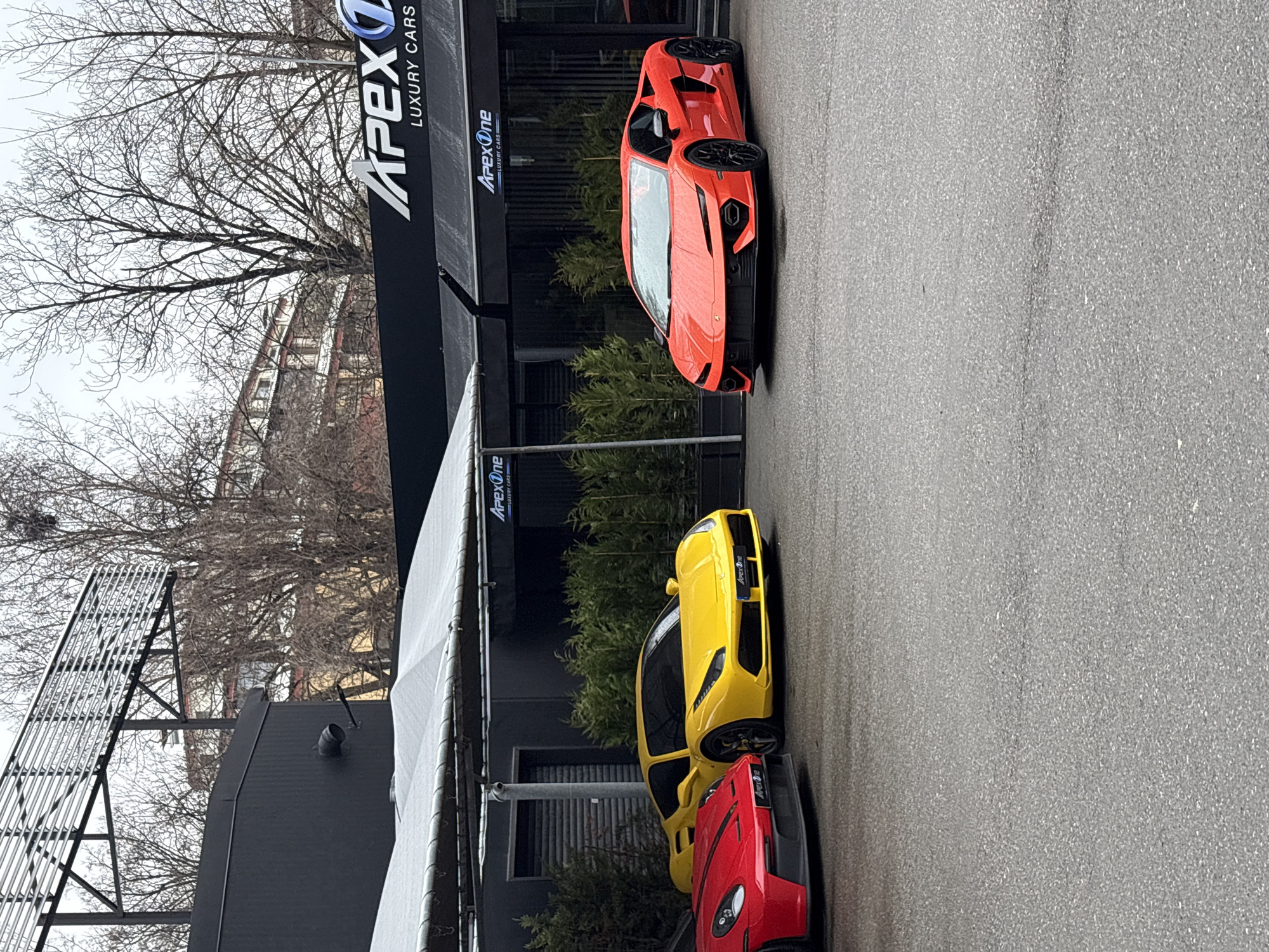 Luxury sports cars spotted at Sofia dealership amid rain