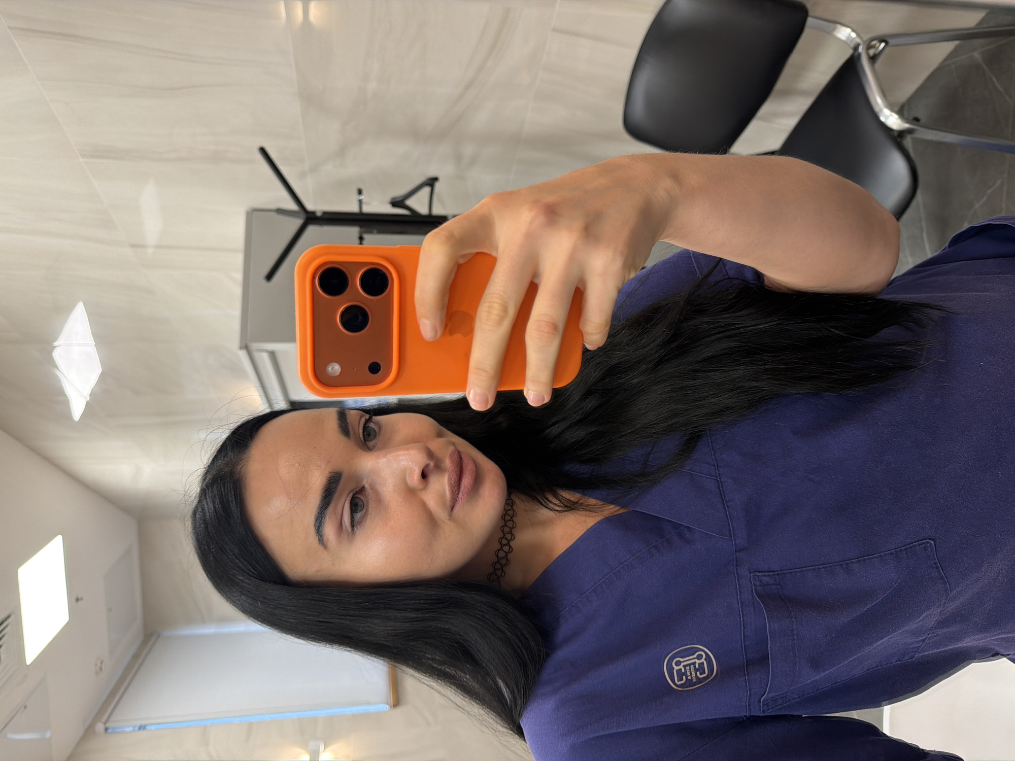 Woman Takes Selfies at Professional Office in Saint Petersburg