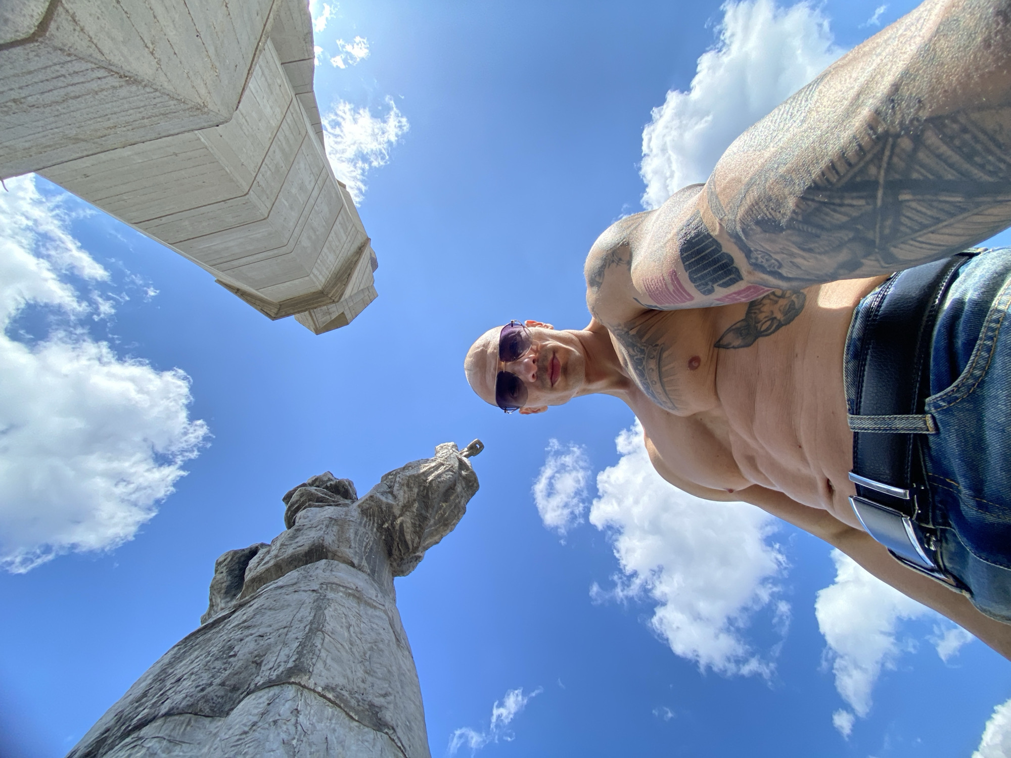 Tattooed man photographed against sky in Pleven, Bulgaria