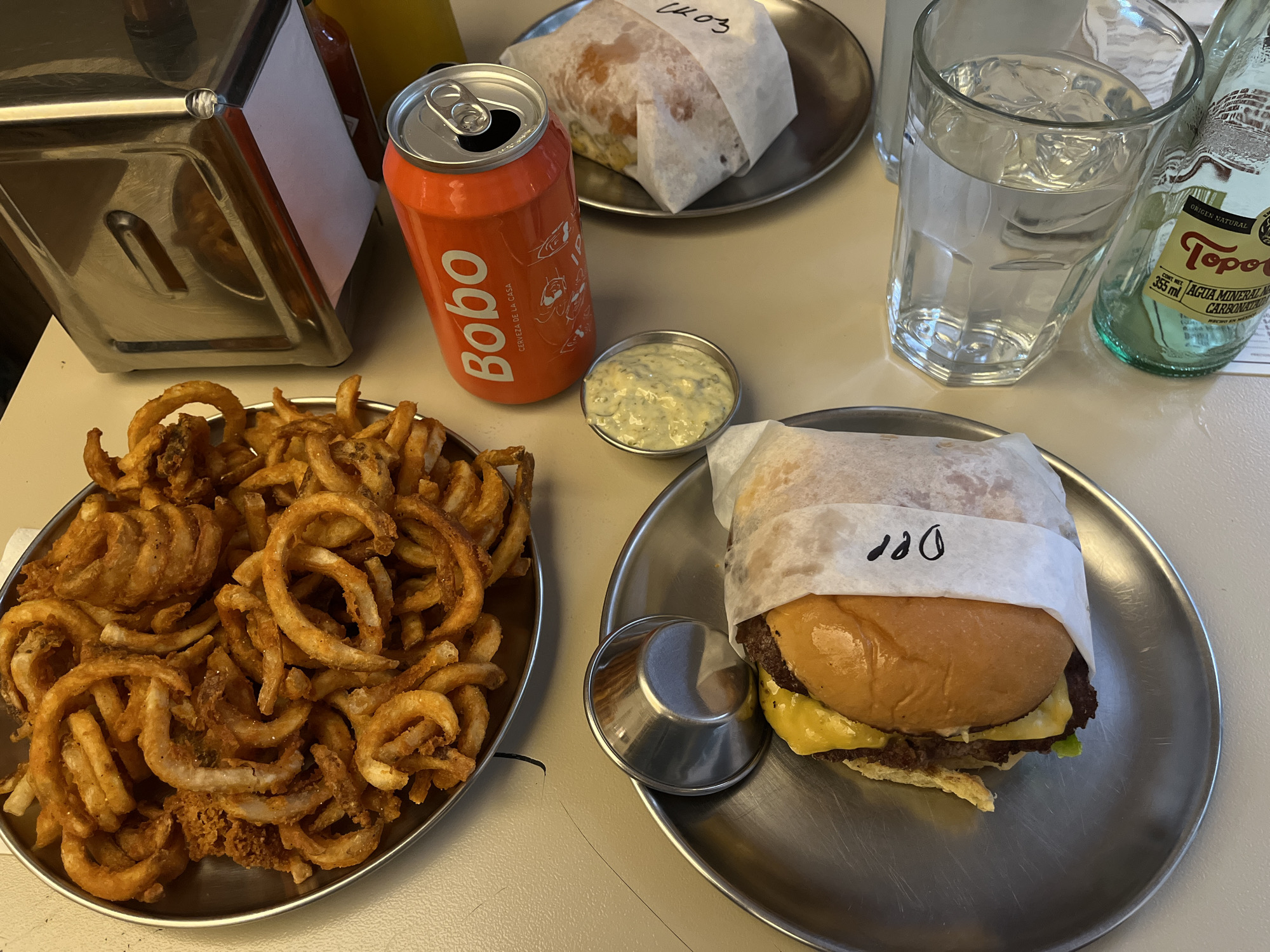 Late night burger meal documented at Mexico City restaurant