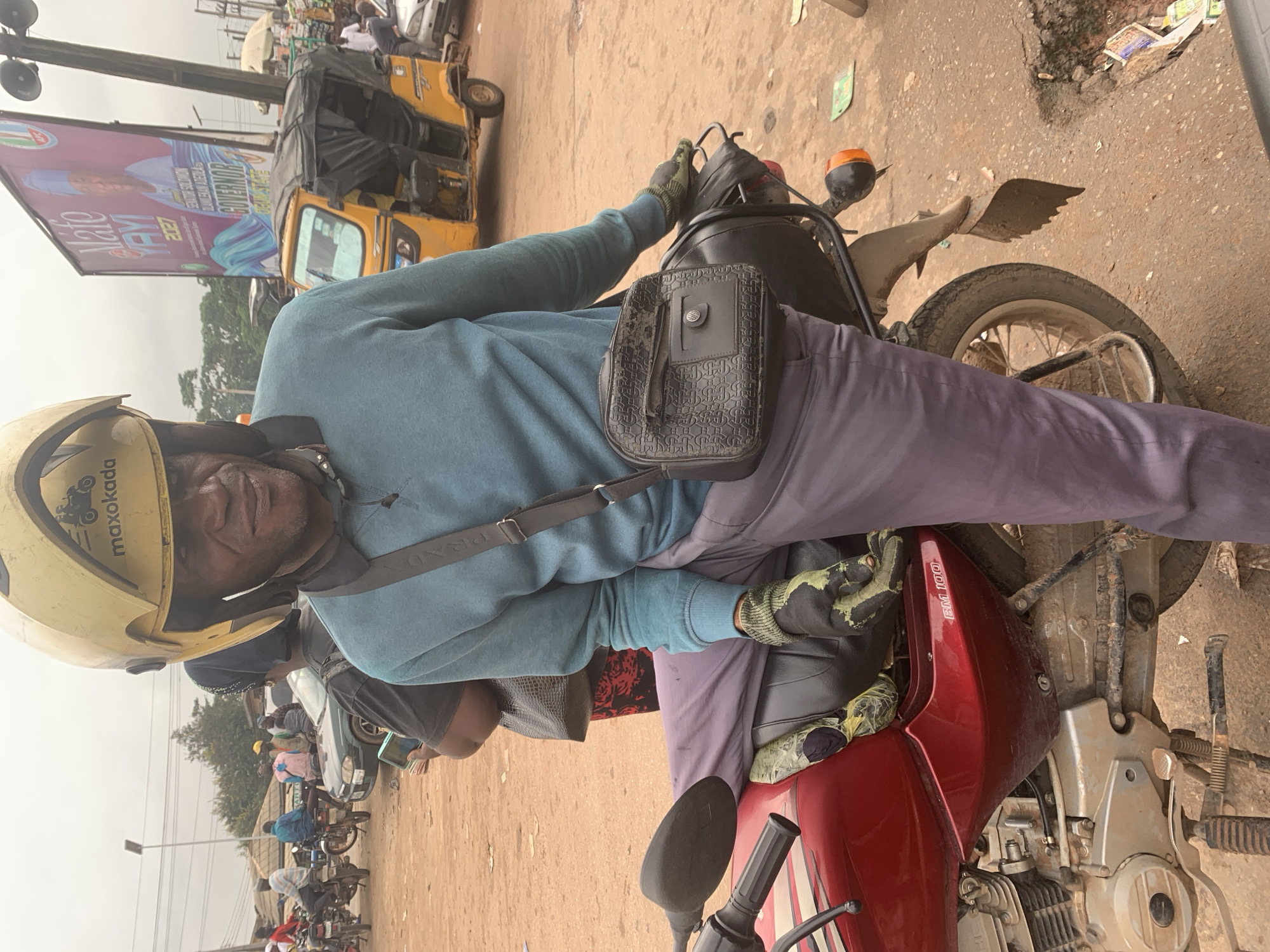 Street life at a Shagamu transport hub, July morning