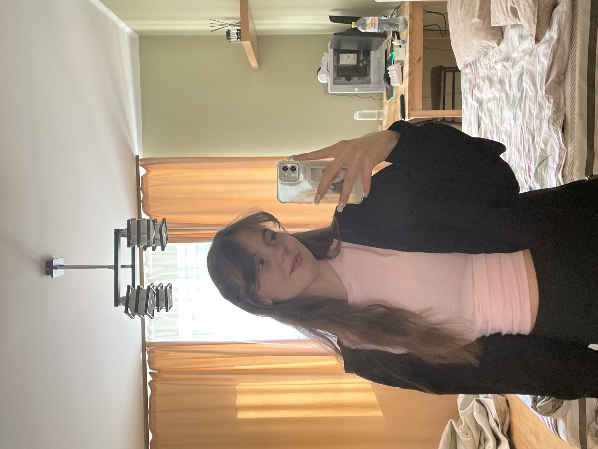 Woman photographed in multiple indoor locations in Ufa