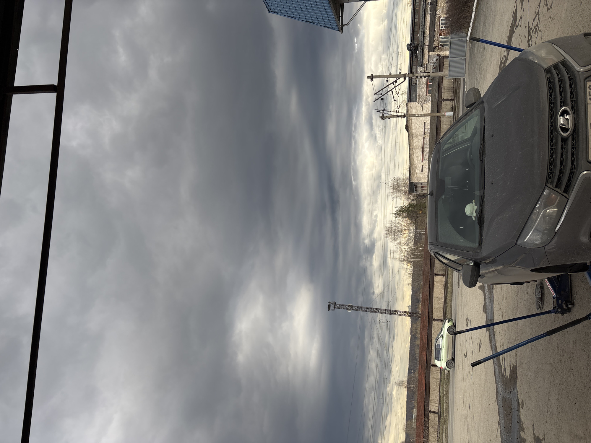 Lada vehicle spotted in industrial Perm under overcast skies