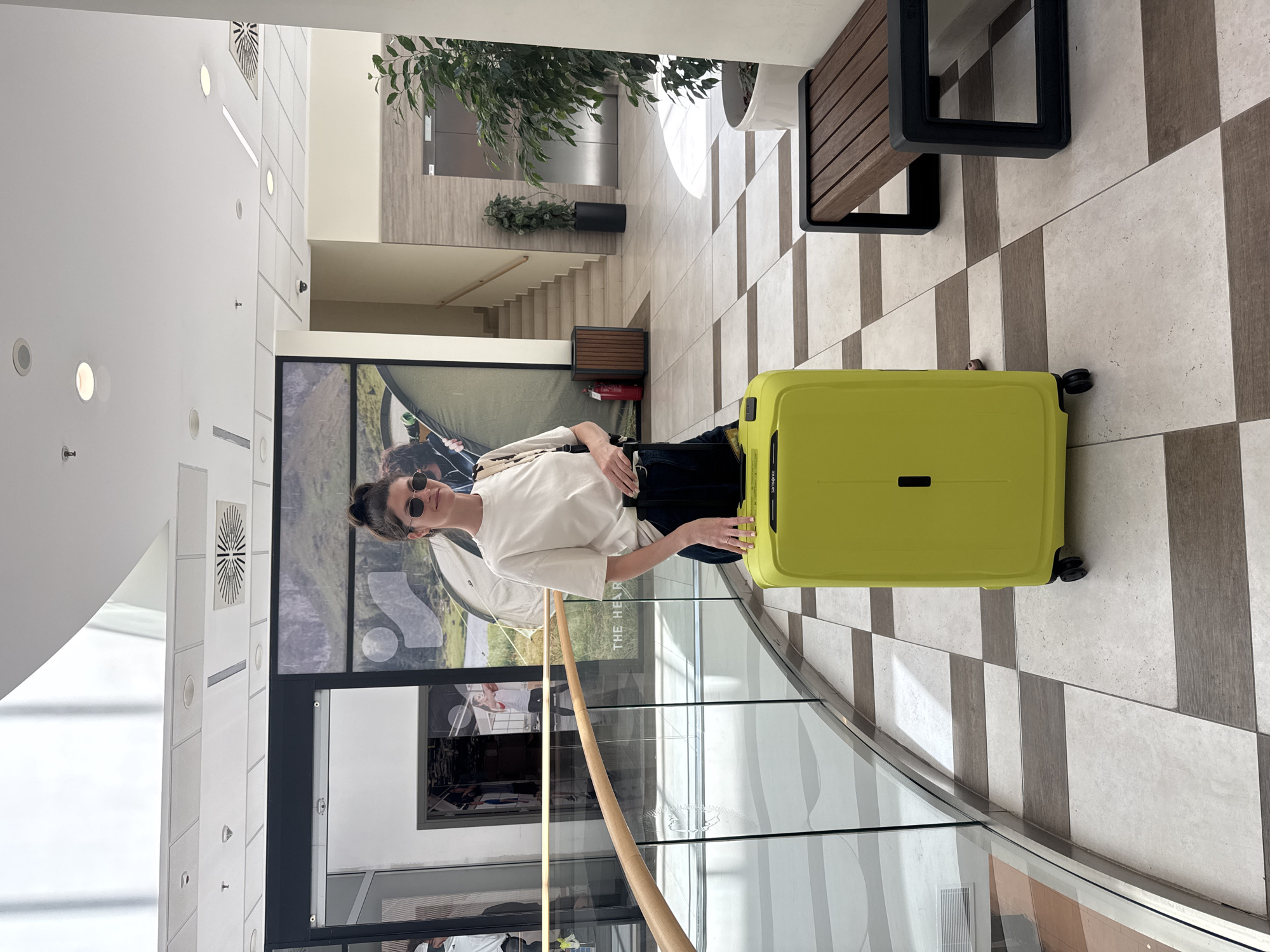 Traveler with yellow suitcase spotted amid Podgorica street scenes