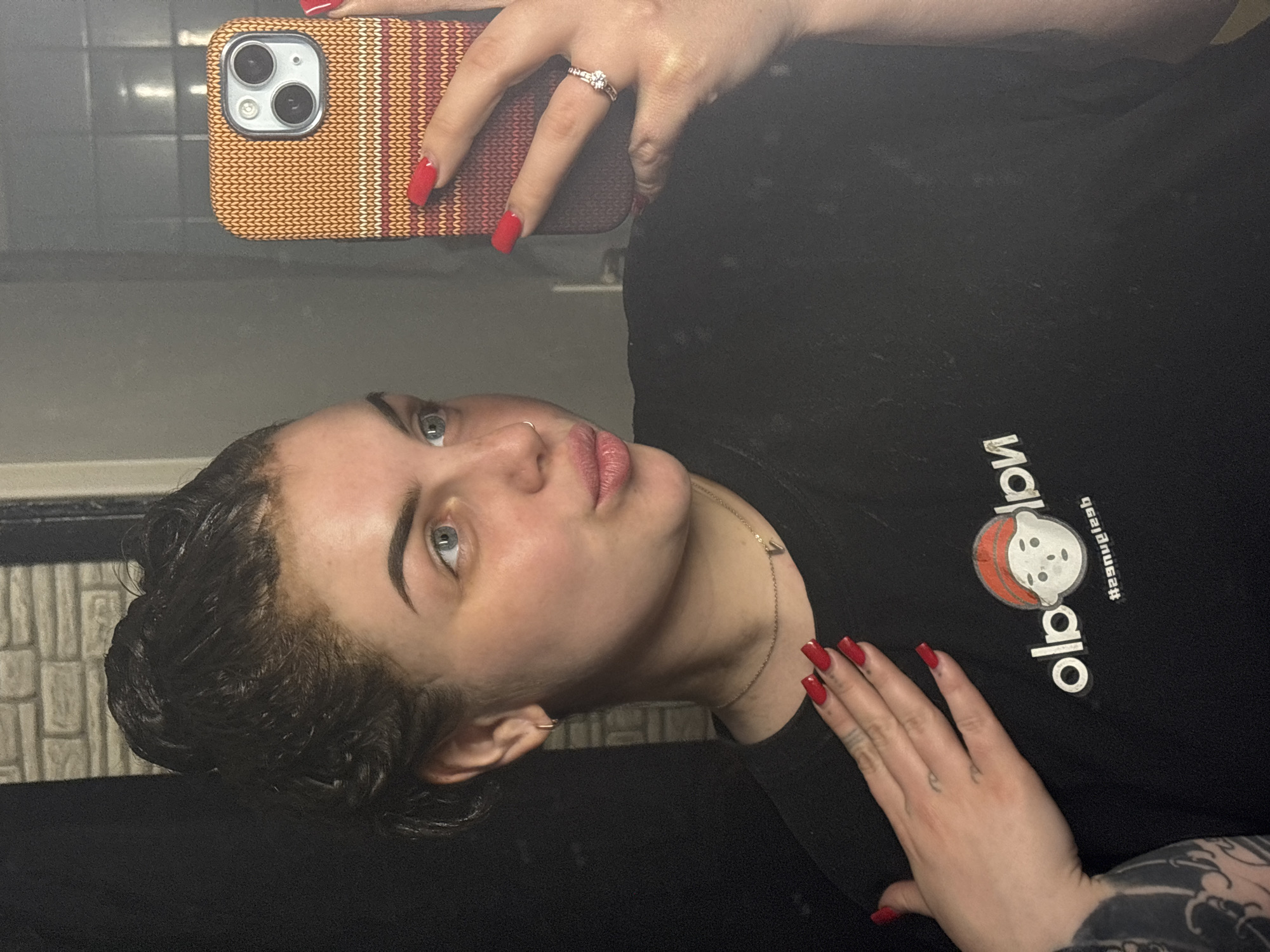 Woman takes bathroom selfies in Chornomorskoe, Ukraine