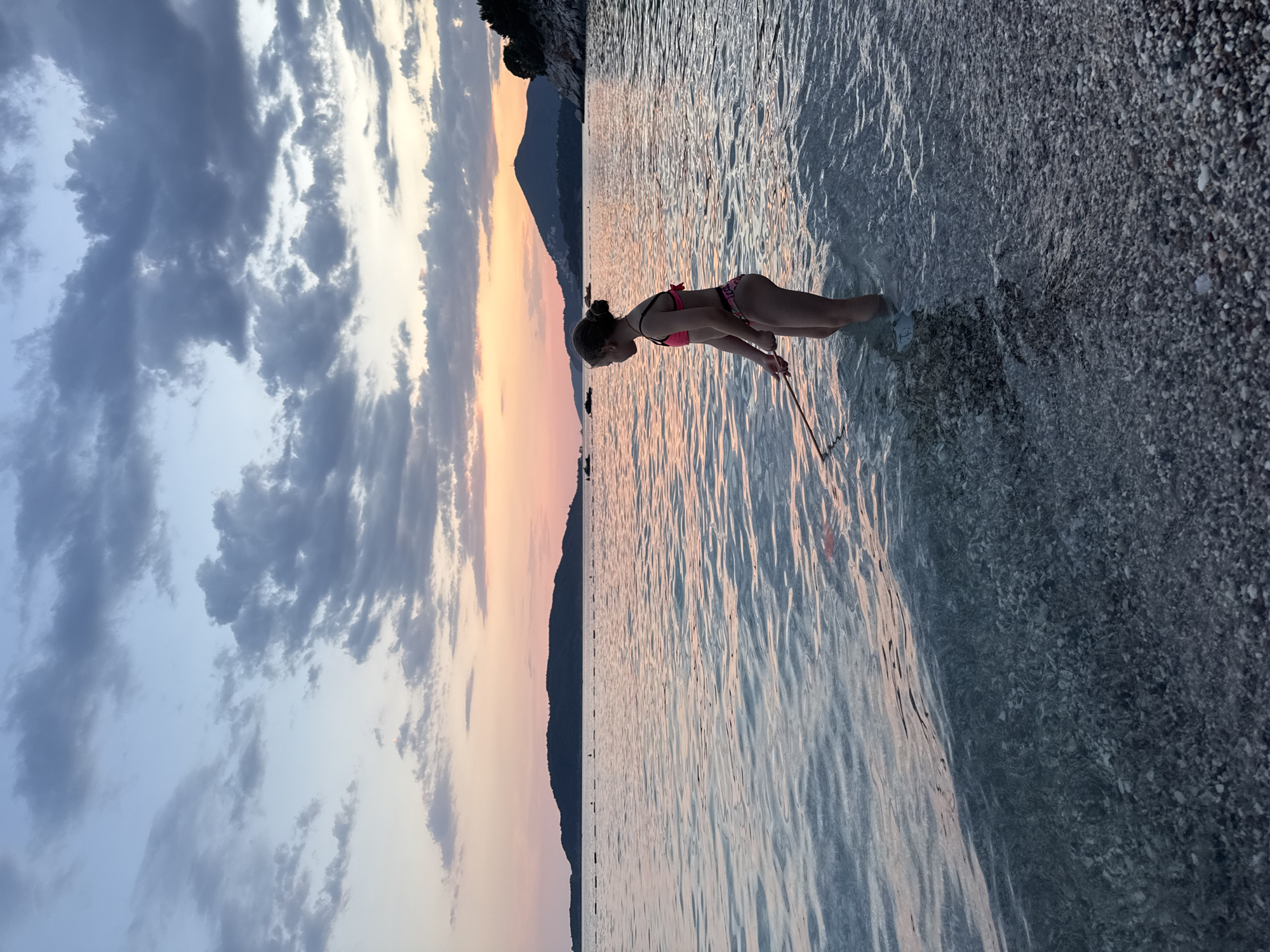 A lazy beach day at Kamenovo fades into a coastal sunset