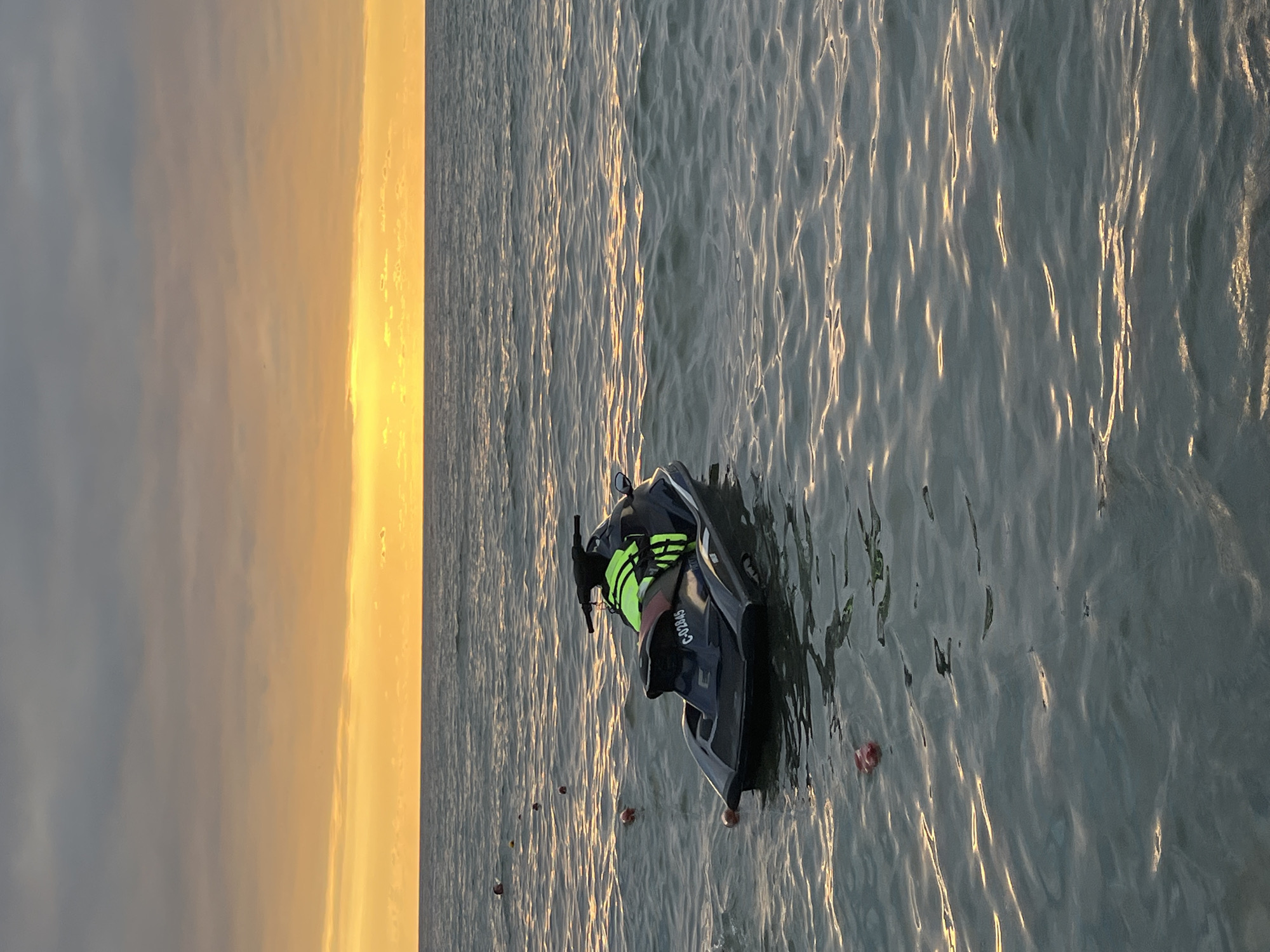 Sunset activity on Ureki's black sand beach, Georgia