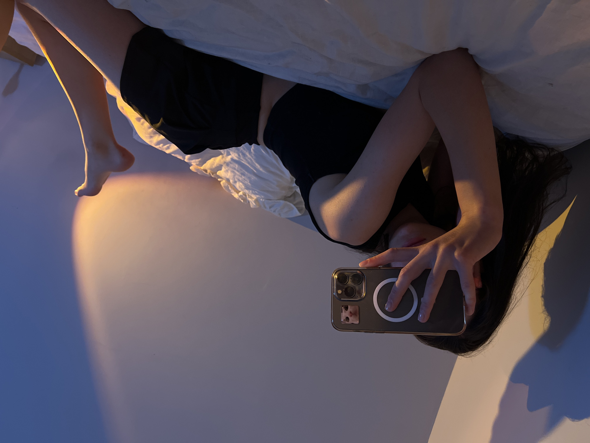 Evening bedroom photo session with golden lighting in Ternopil