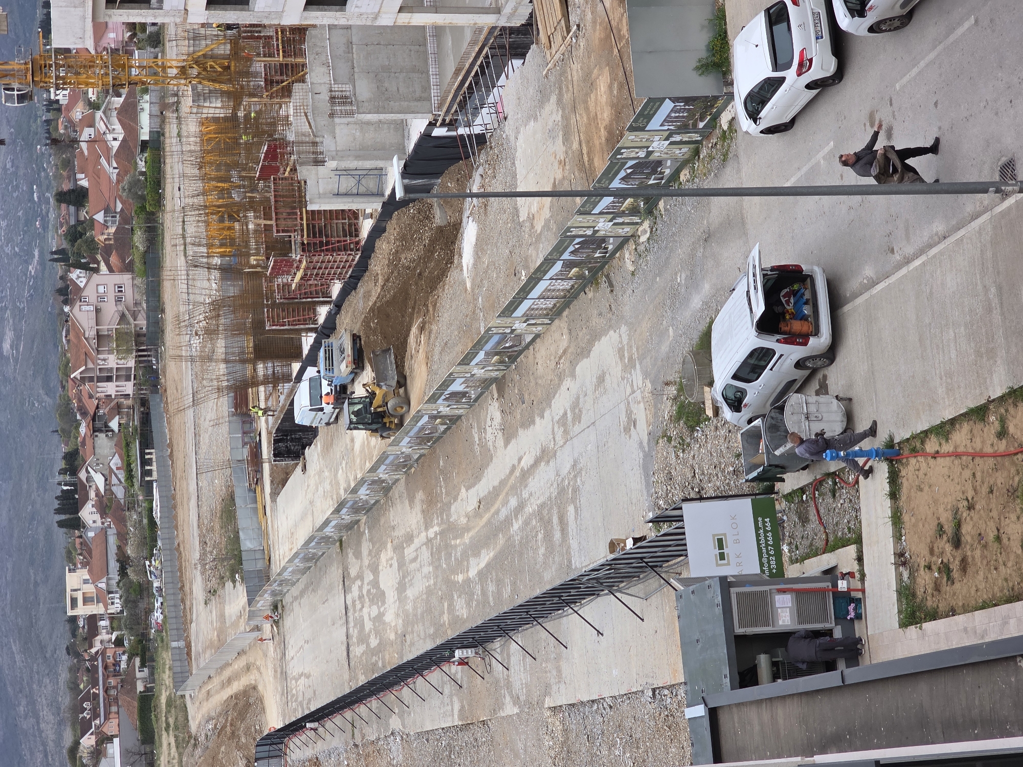 Construction work underway in Podgorica with cranes and transformer
