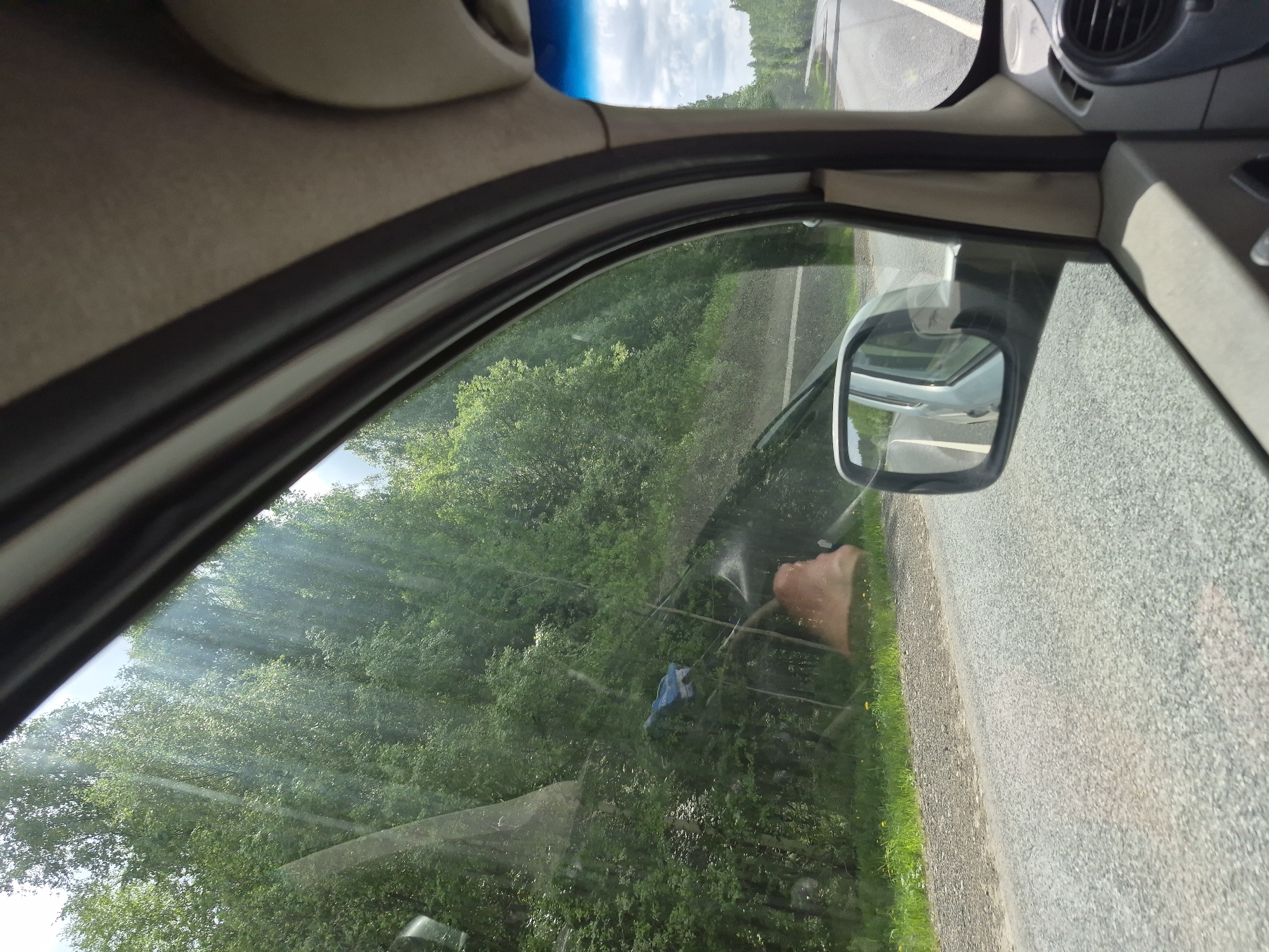 Morning drive through rural Chernovskoye captured by passenger