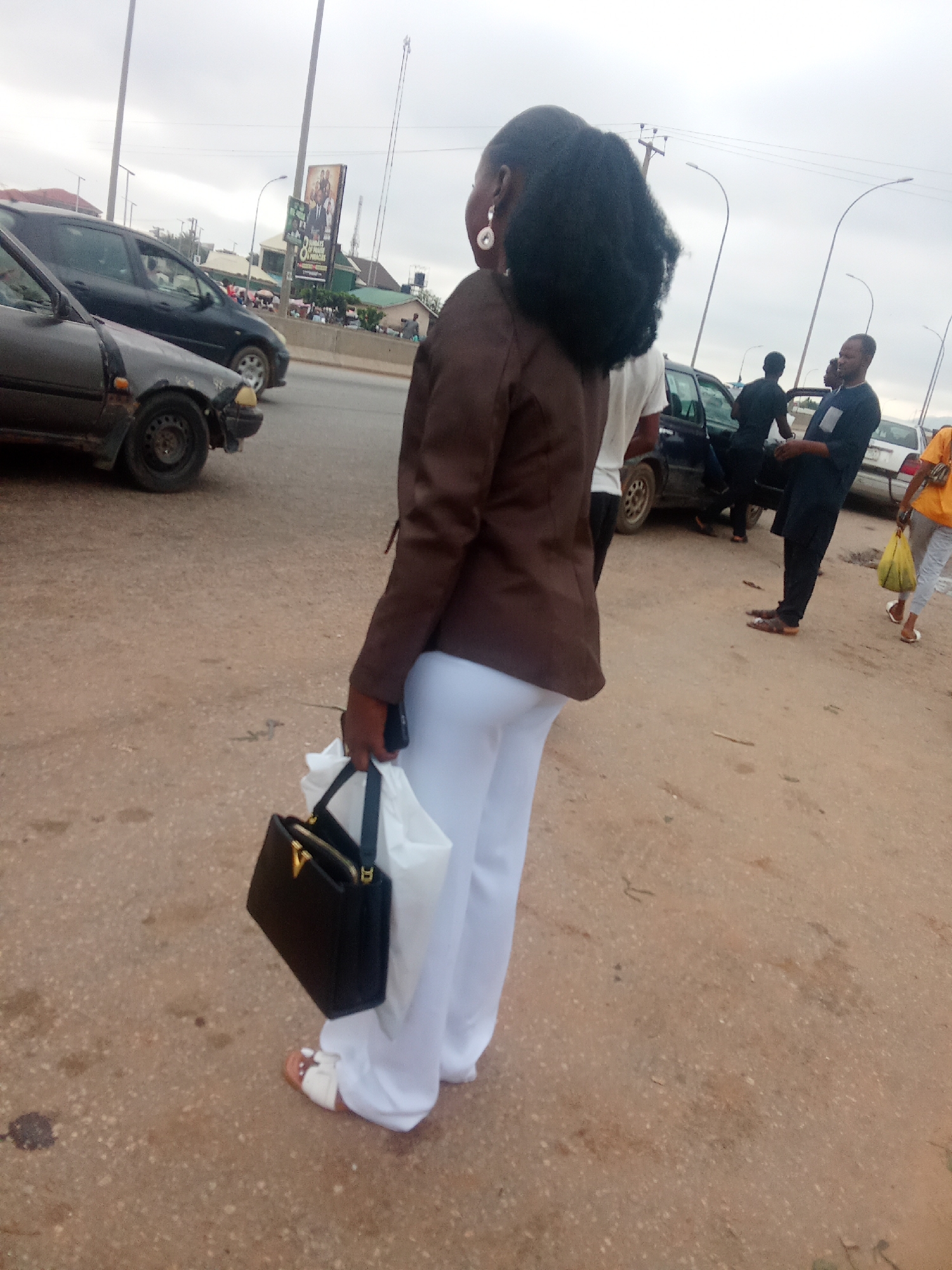 Morning street life along a busy Kagini highway