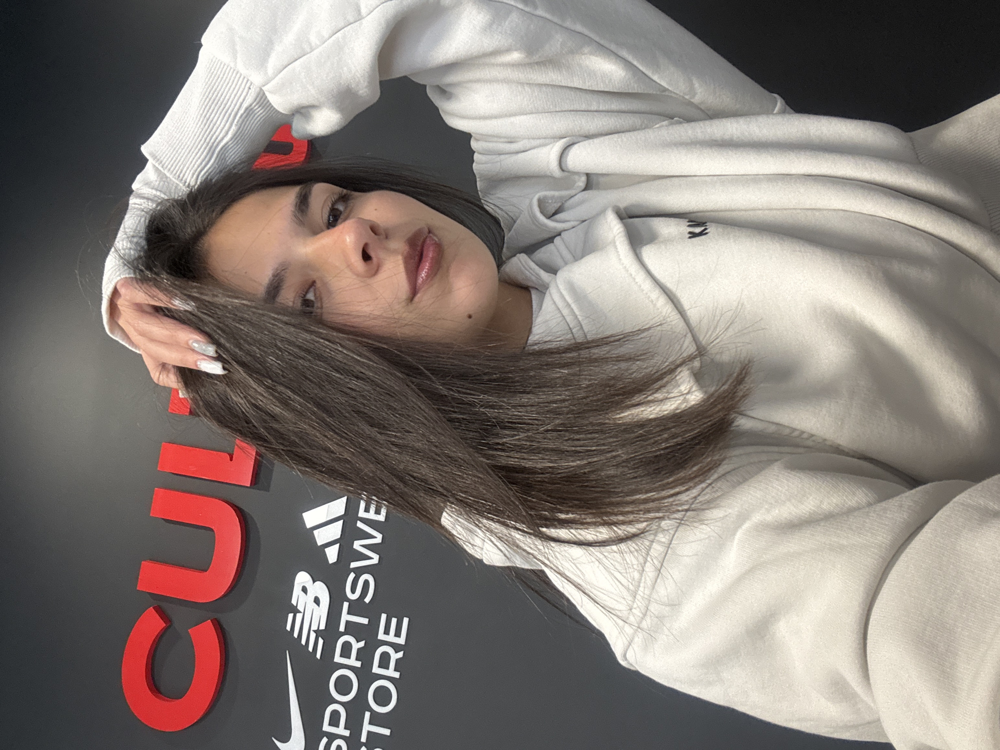 Woman poses for photos in Gabrovo sporting goods store