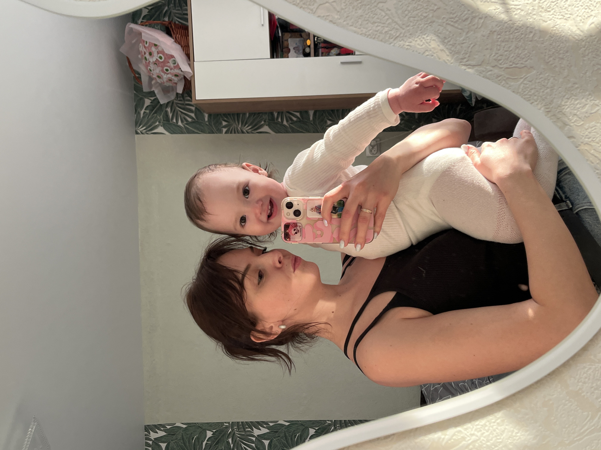 Mother and baby mirror selfie captured in Saint Petersburg