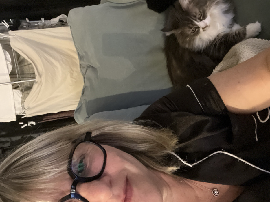 Woman documents evening routine with pets in French home