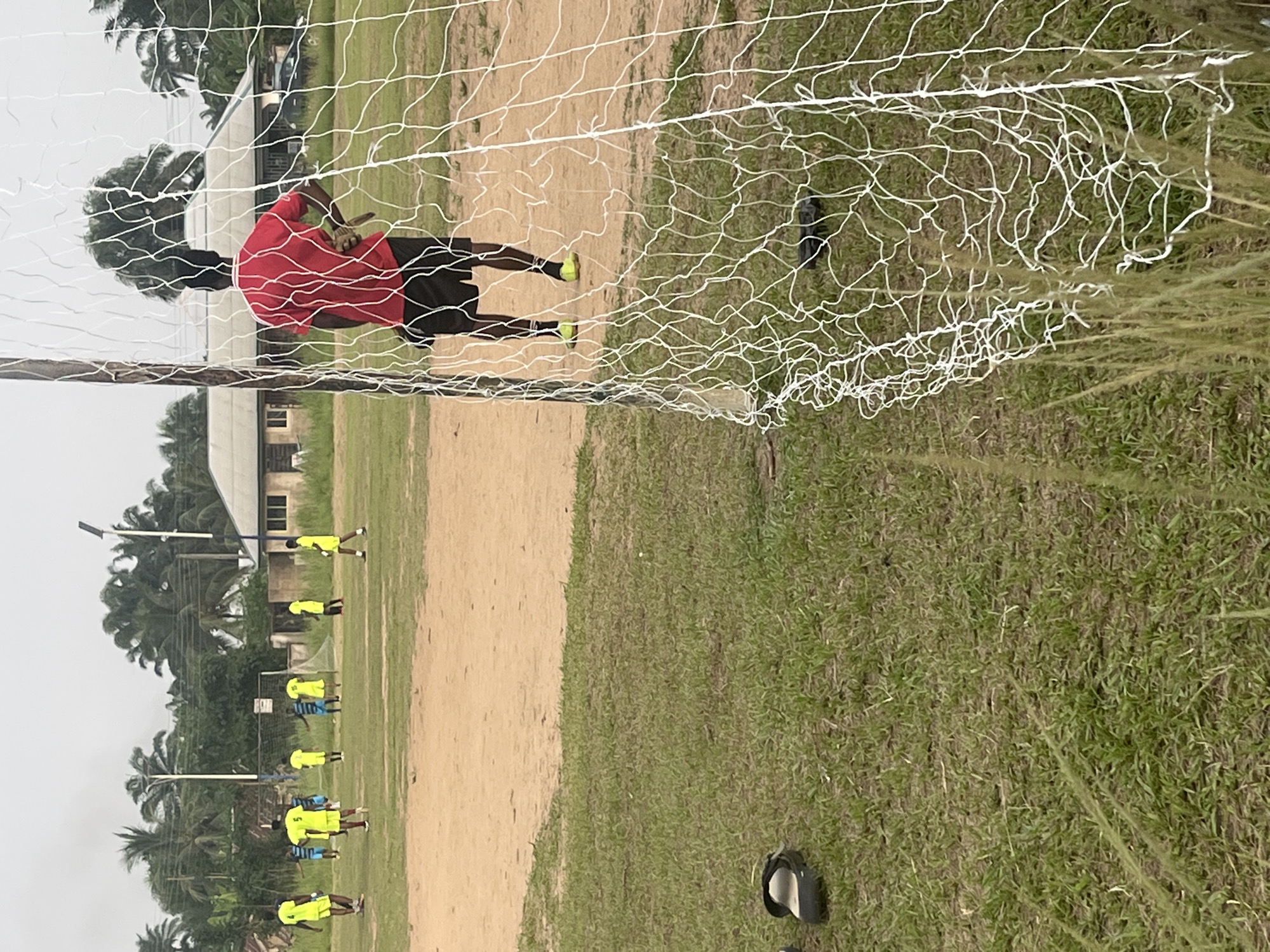 Soccer match played between yellow and blue teams