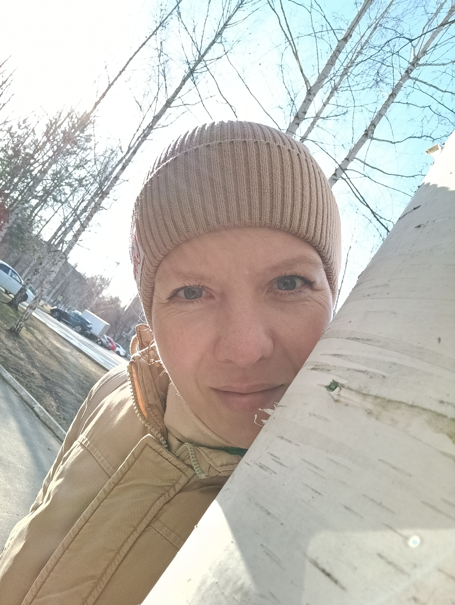 Woman takes selfies in Russian forest near Chaikovsky