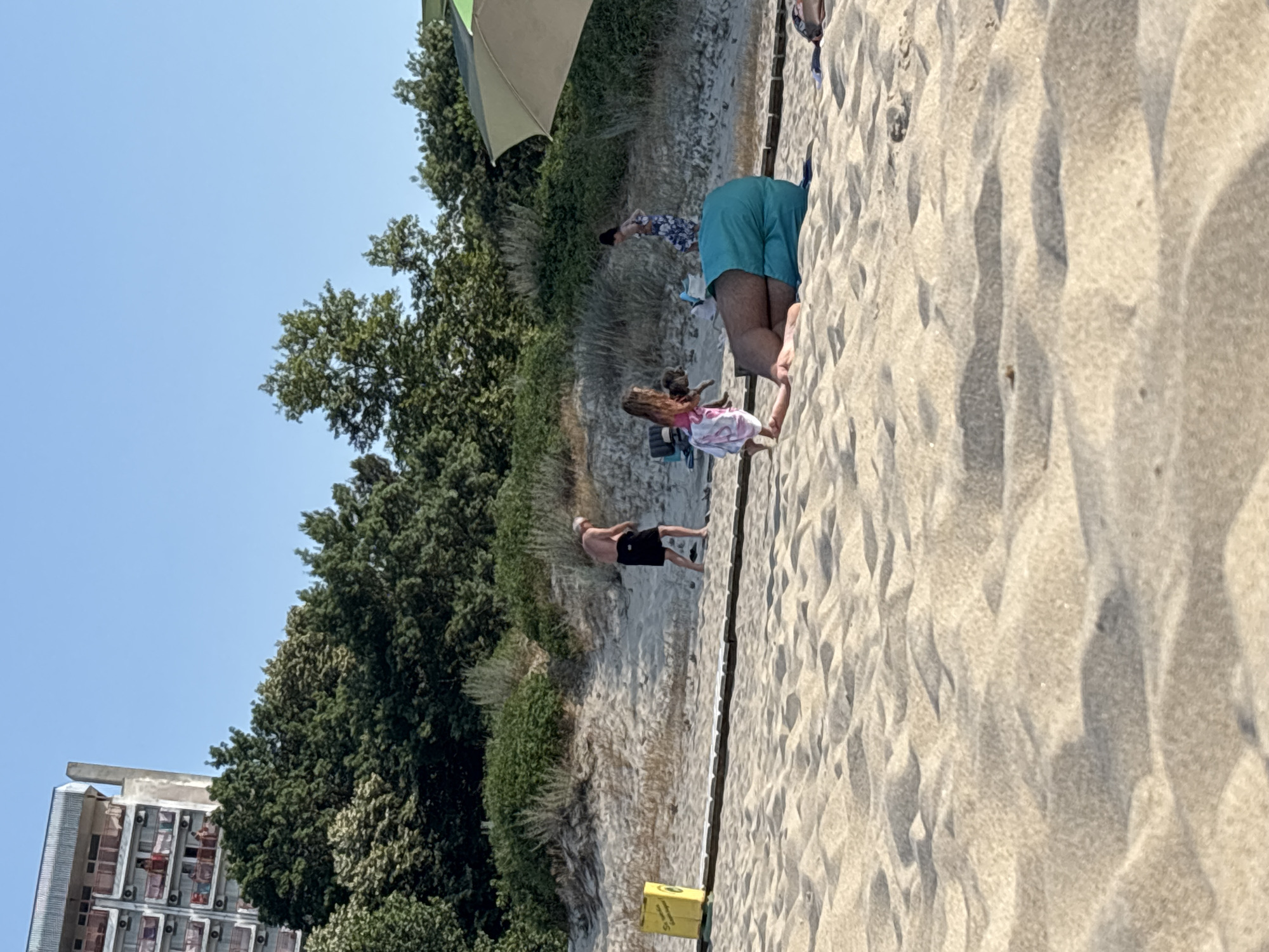 Crowded summer beach day in Kiten, Bulgaria