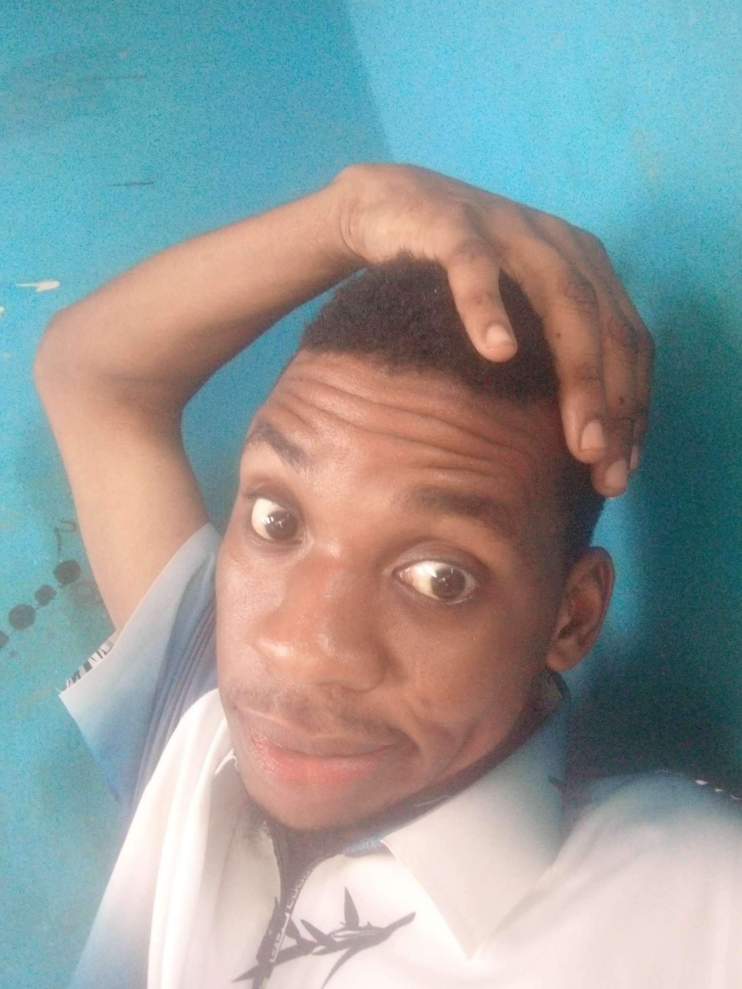 Young man takes selfie in Ikorodu, Nigeria