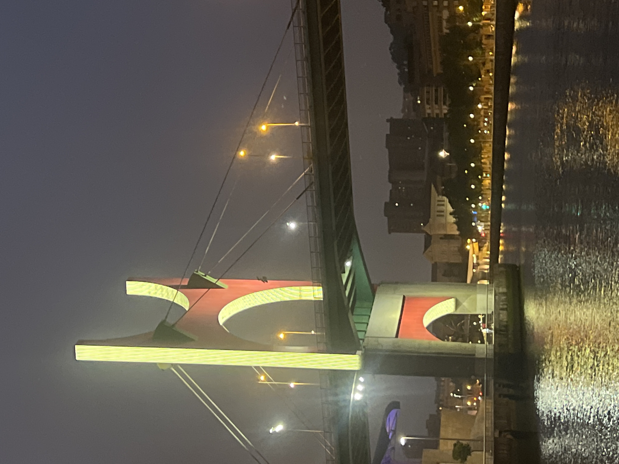 Night walk along Bilbao's Nervión riverside landmarks