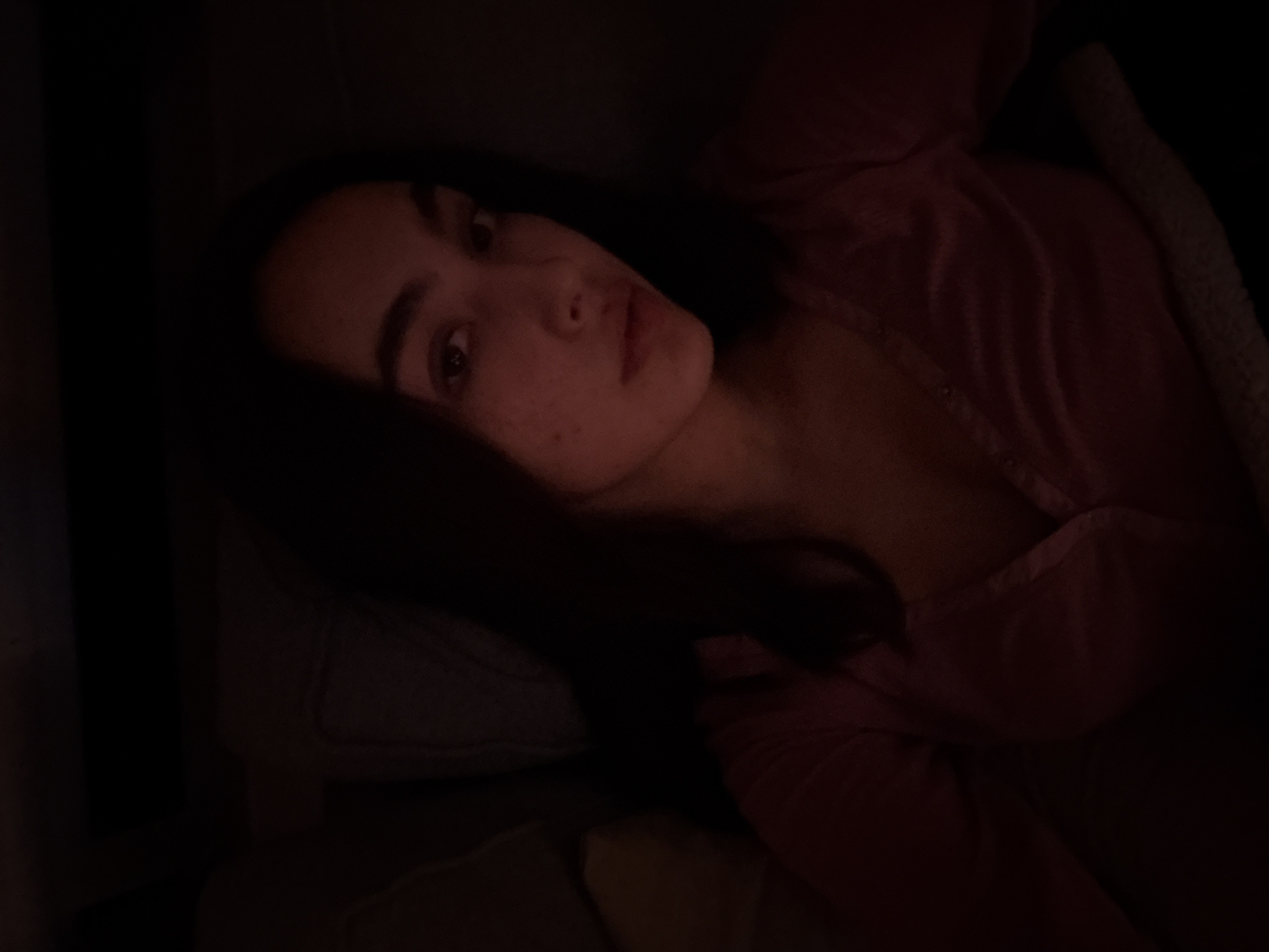 Woman rests indoors during early morning hours in Mexico City