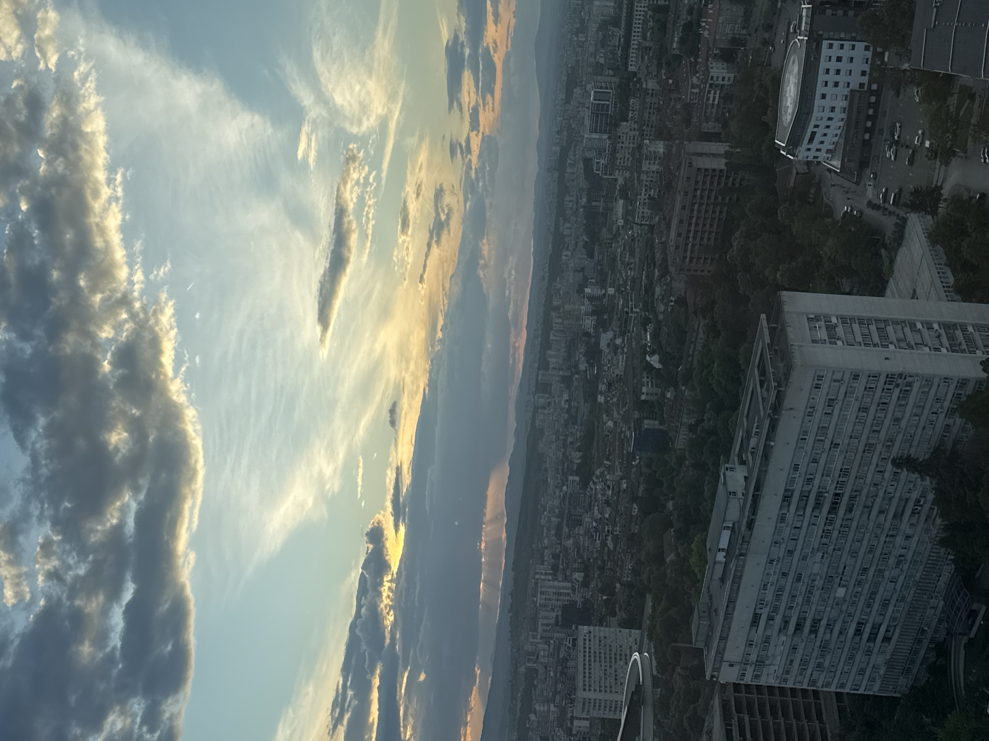 Dramatic clouds captured over Sofia cityscape from aerial view