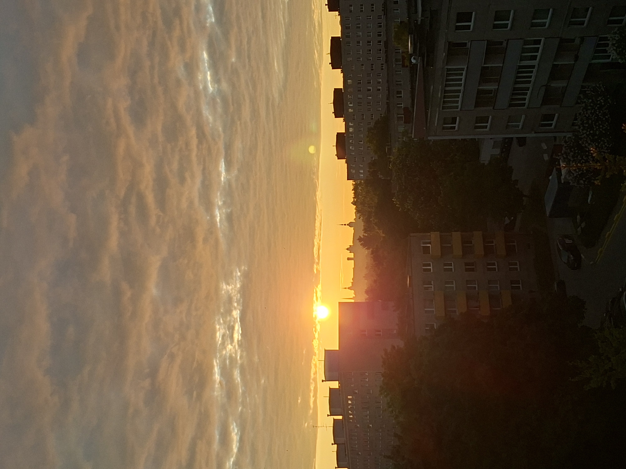 Urban sunrise captured from high-rise vantage point