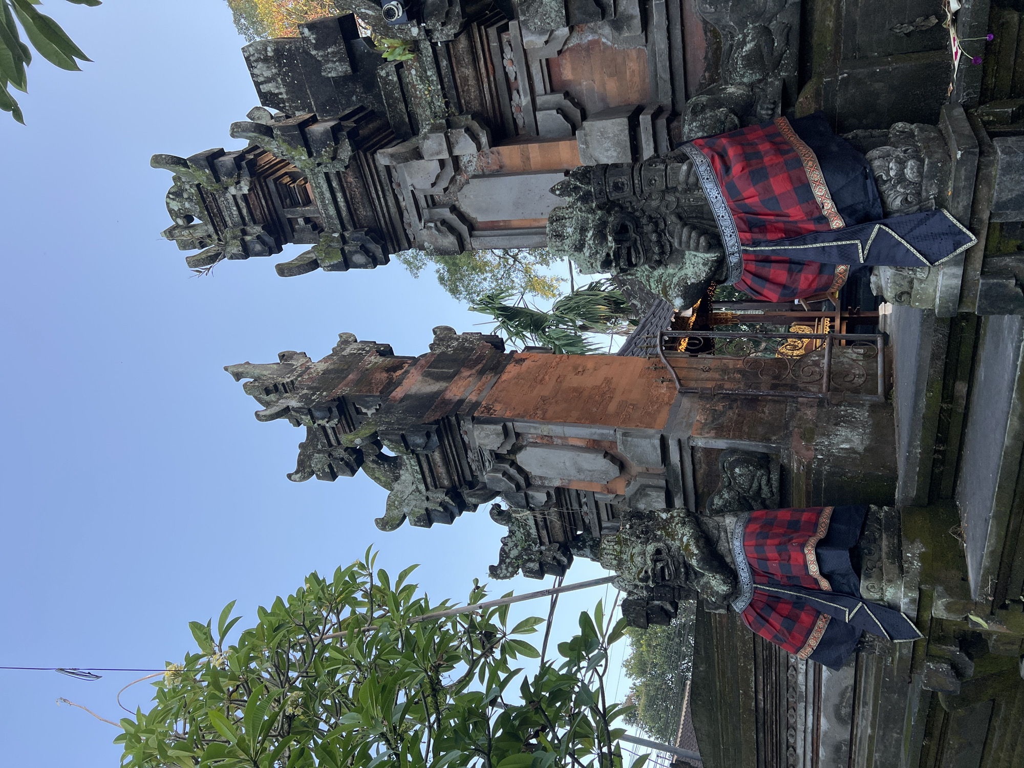 Ornate stone guardian gateway at a Balinese temple, Ubud