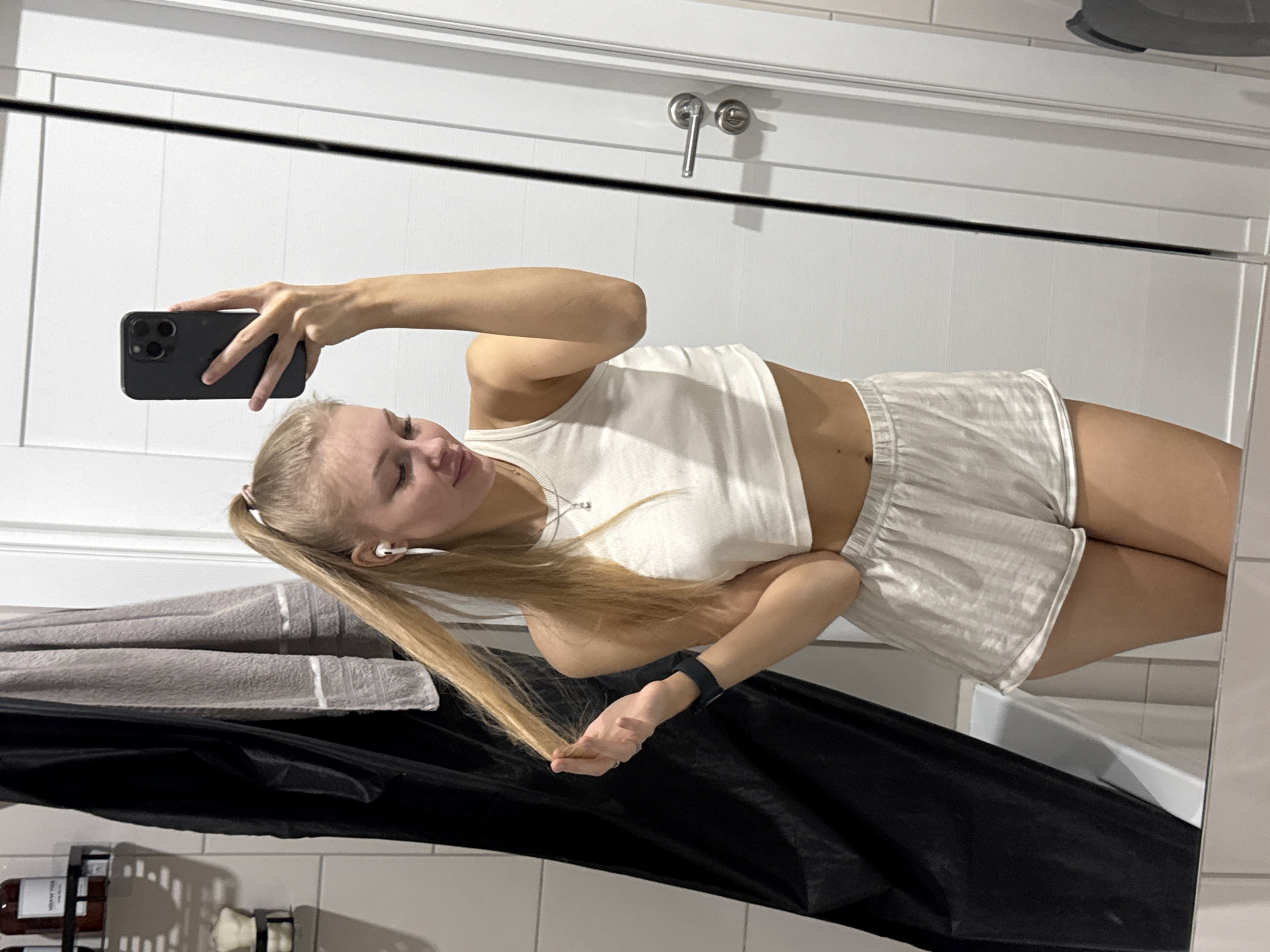 Mirror selfies in a Perm apartment, casual morning routine.